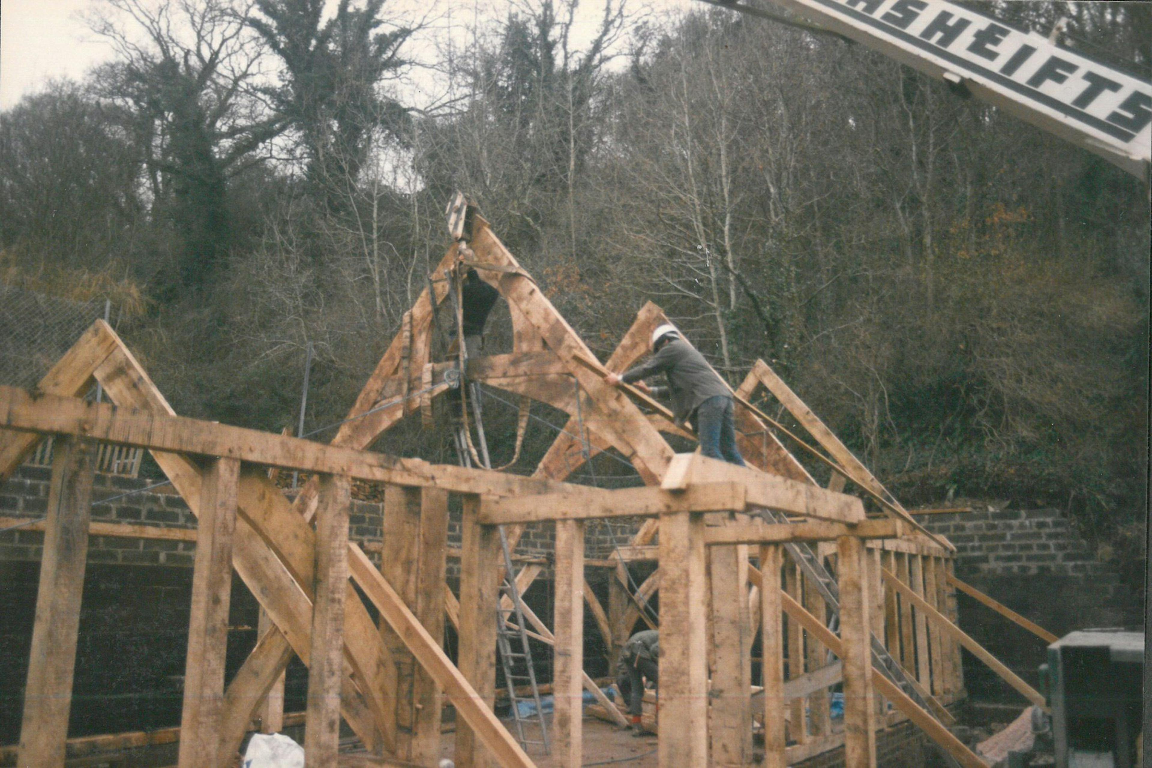 Installation of an oak framed home with a cruck truss
