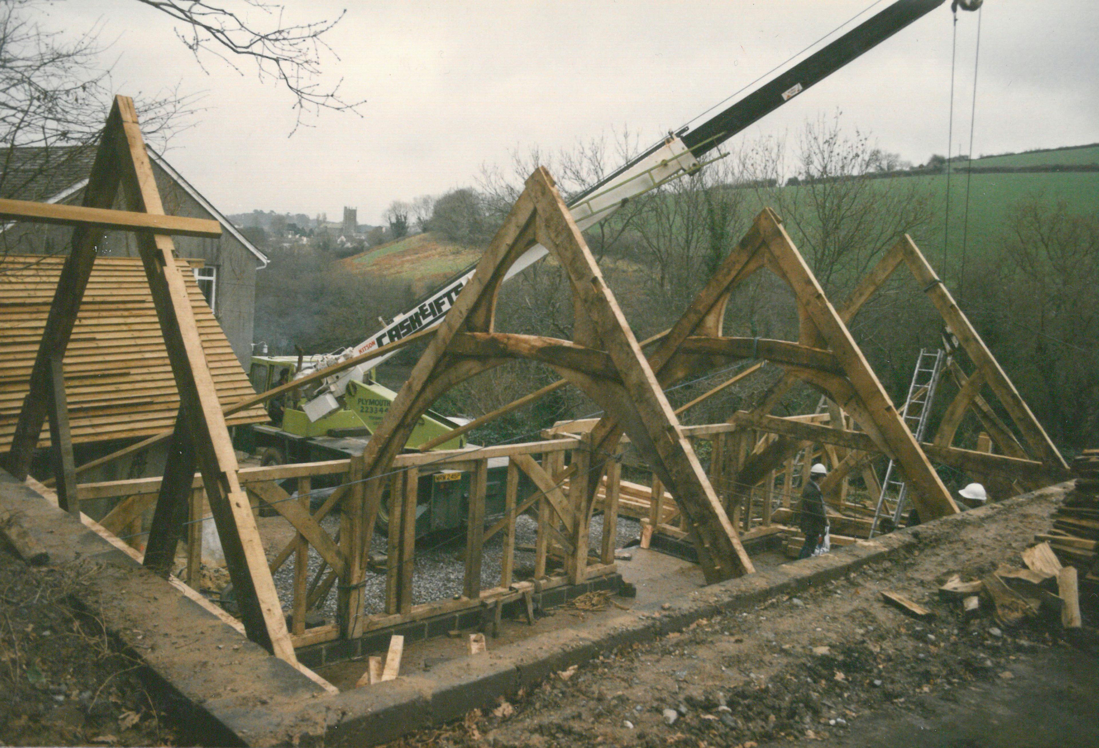 Installation of an oak framed home with a cruck truss