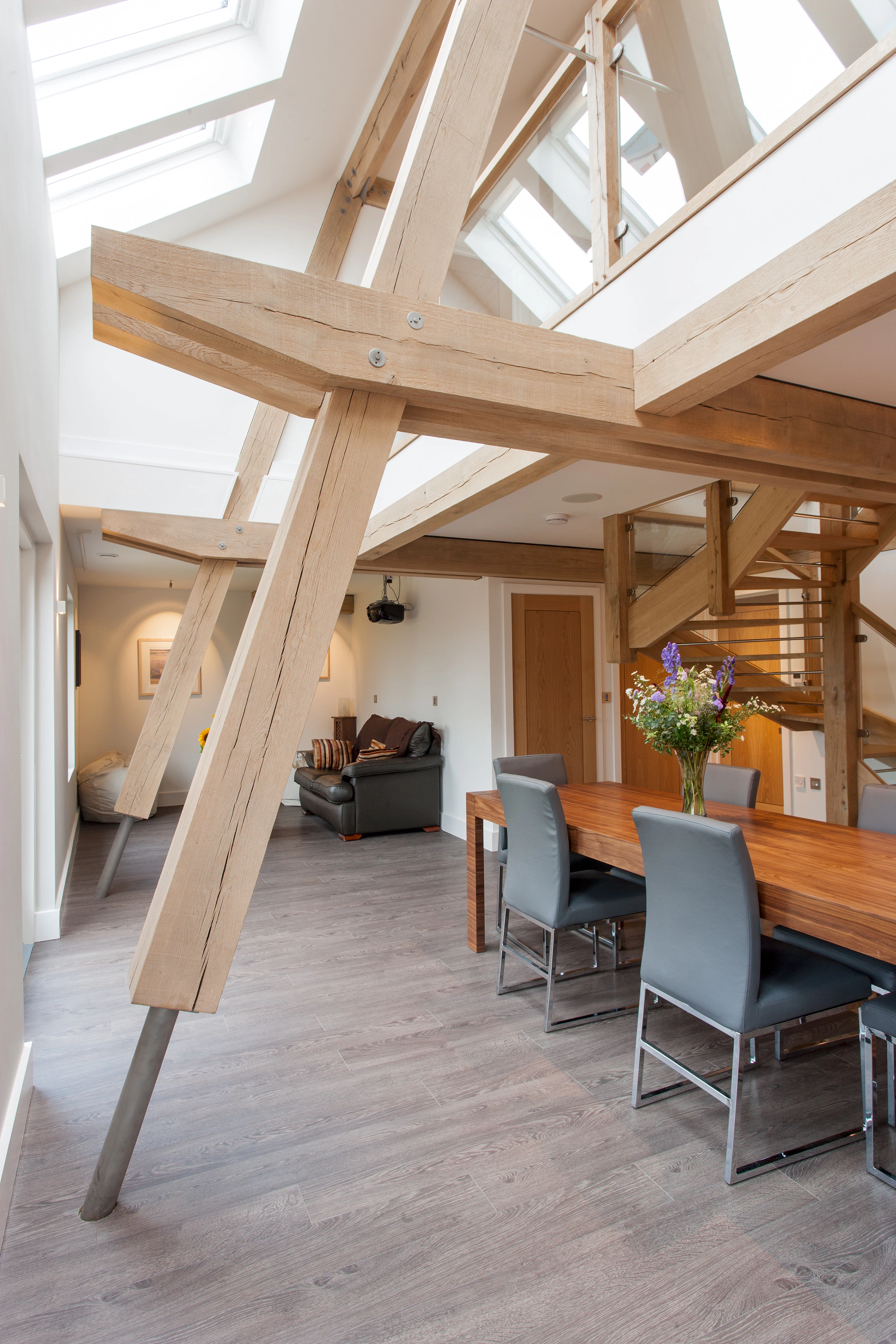 A dining area in a modern oak and steel framed home