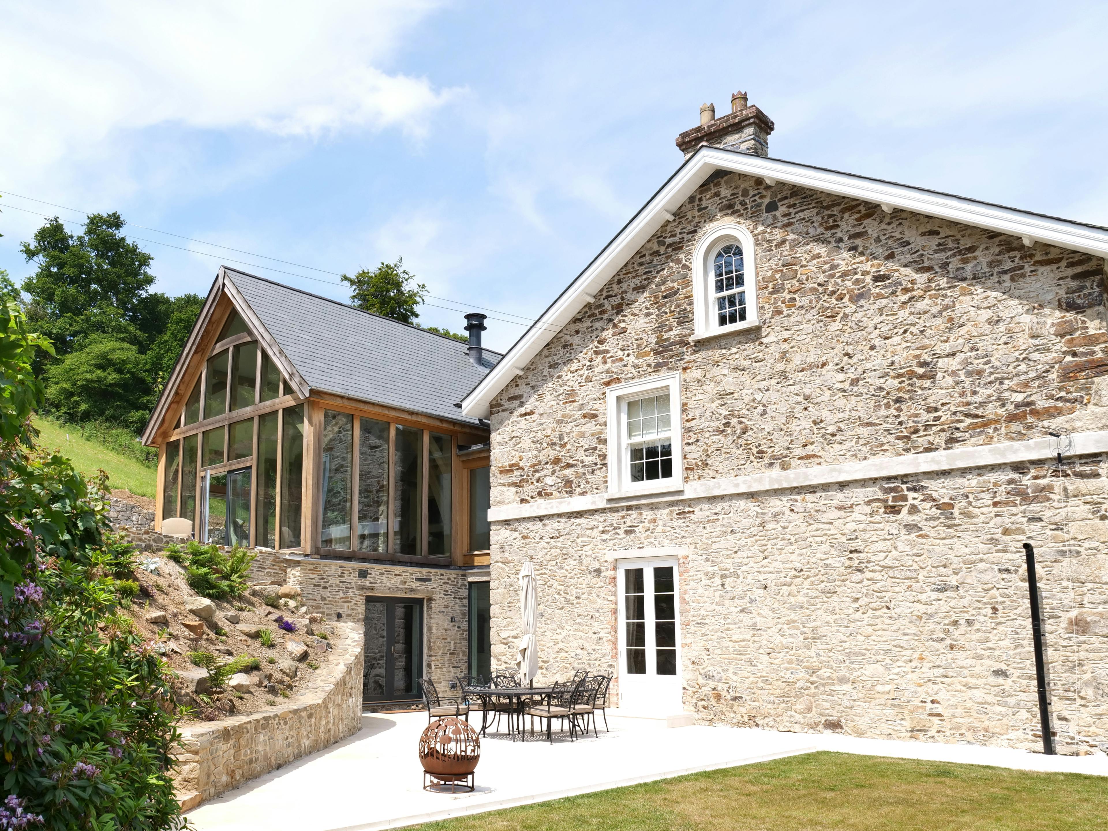 An oak framed extension to an old stone farmhouse