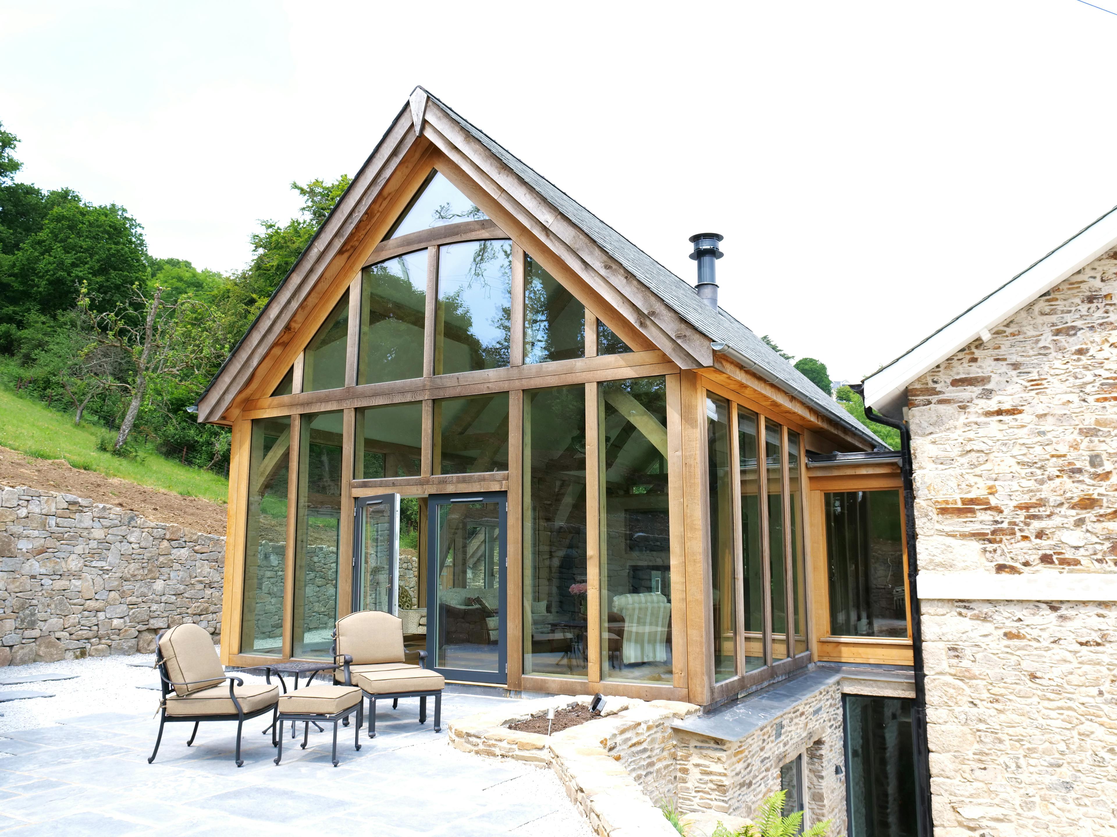 An oak framed extension to an old stone farmhouse