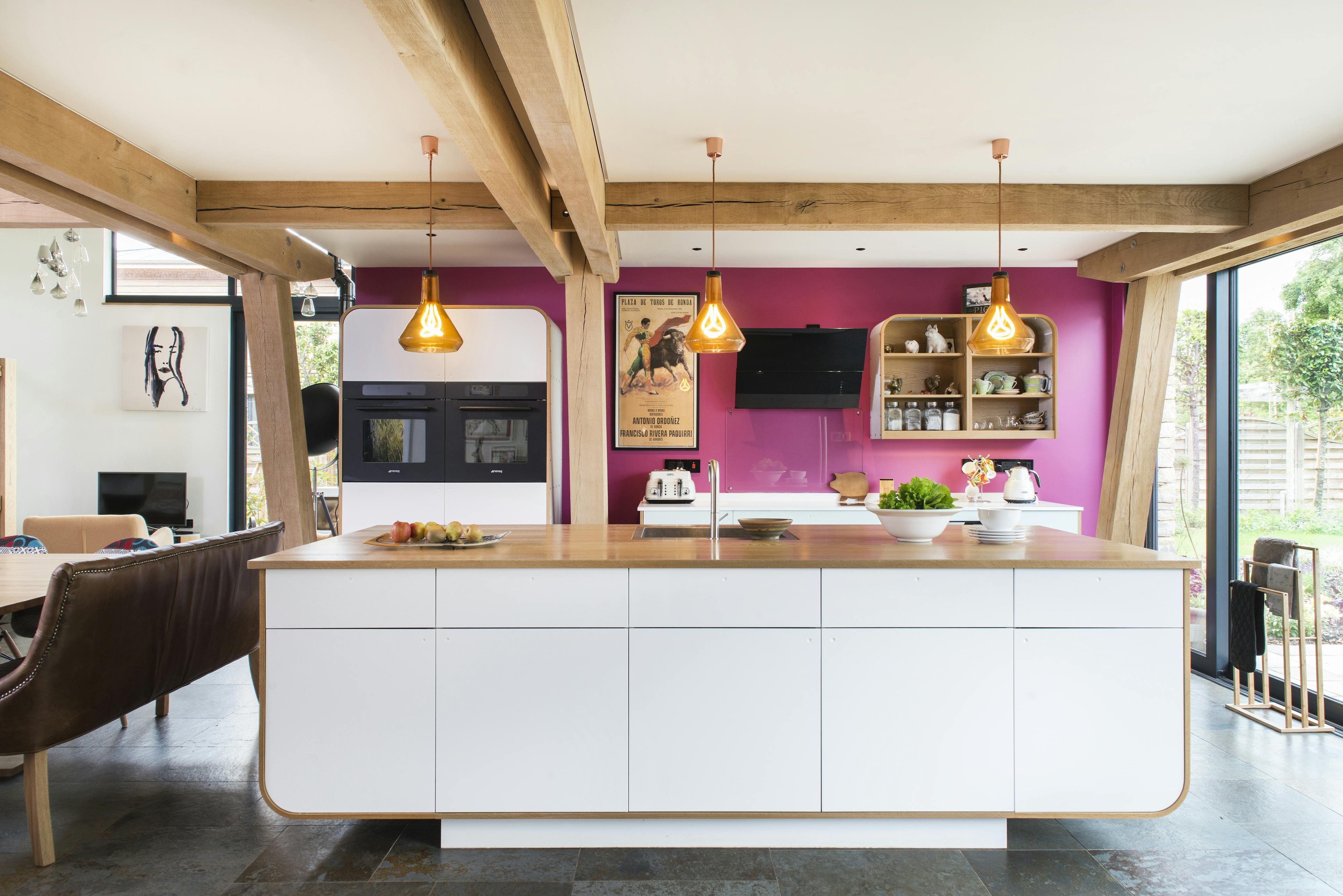 An oak framed kitchen with large white island