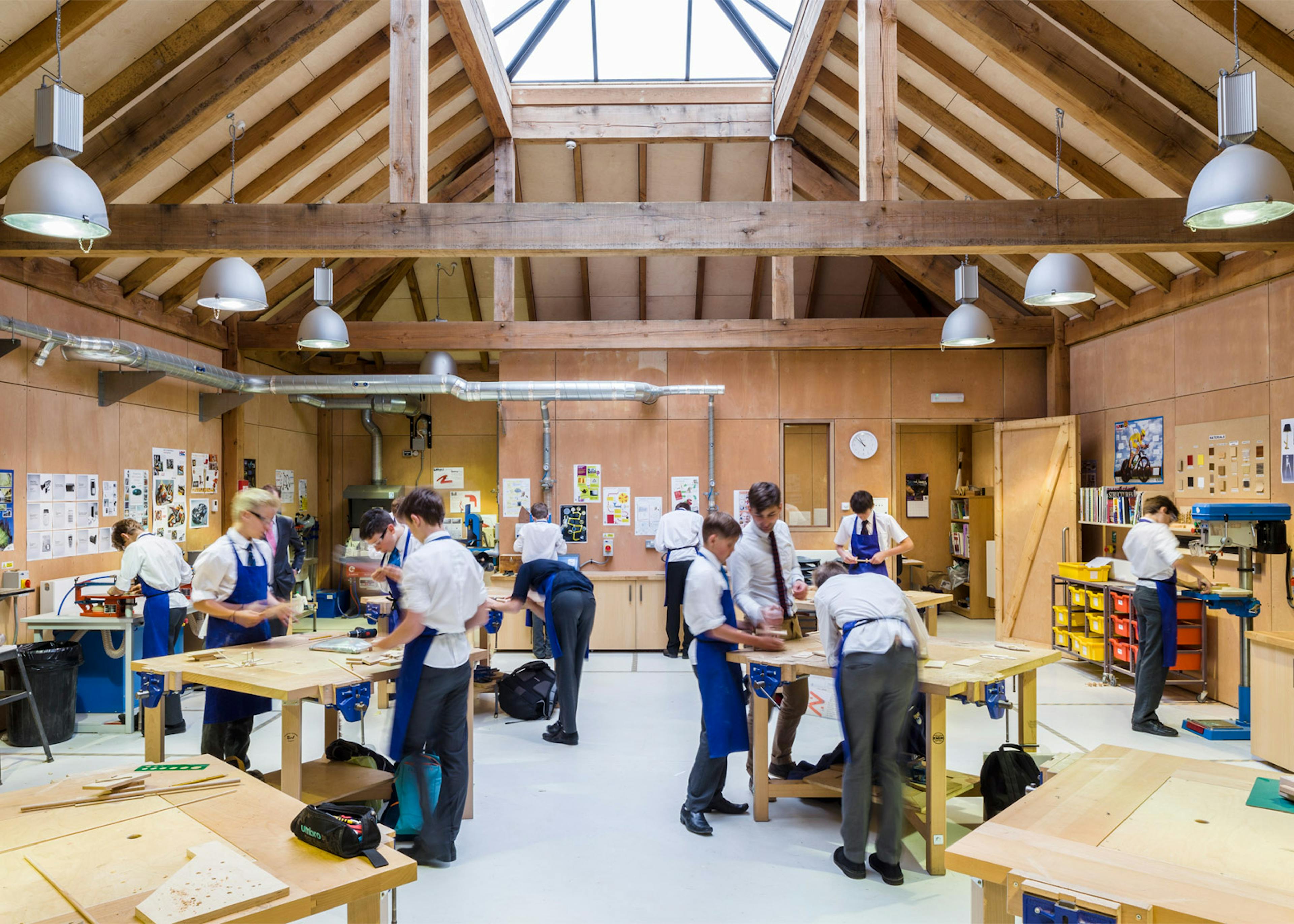 A Douglas fir framed school building with design and technology pupils