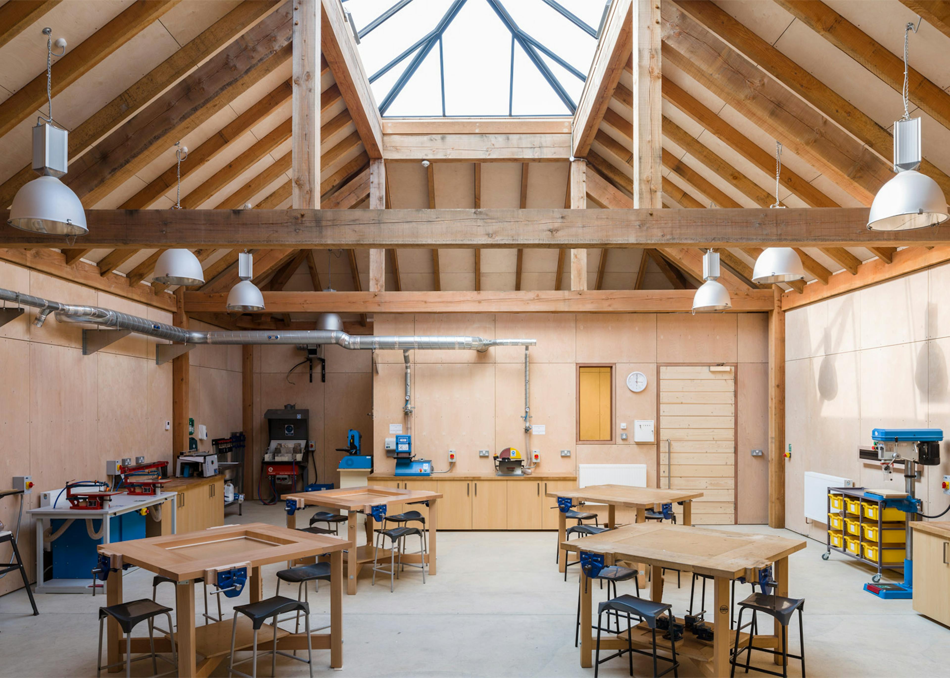 A Douglas fir framed school building with a large rooflight