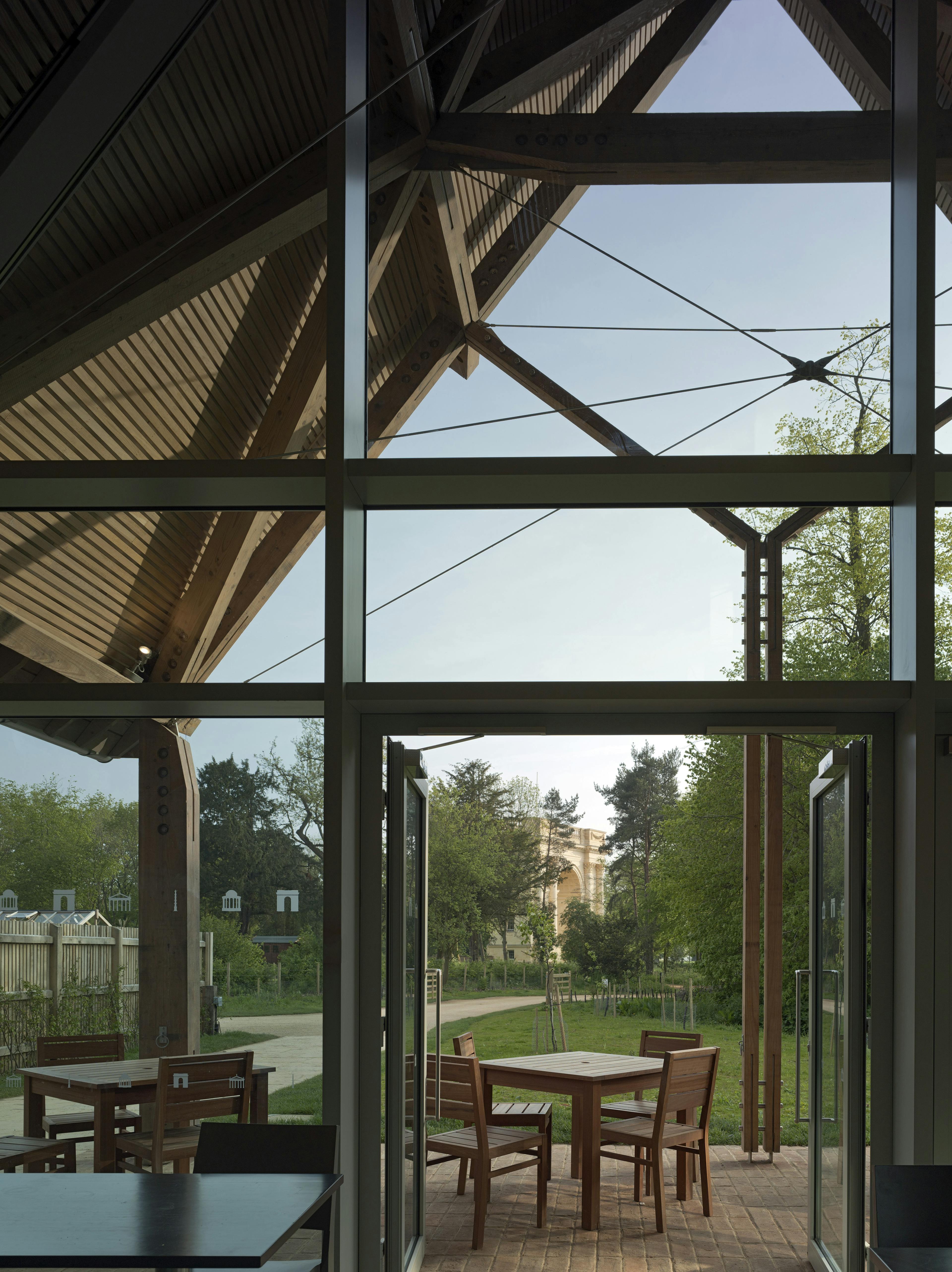 A visitors centre and cafe made with a diagrid roof constructed from larch
