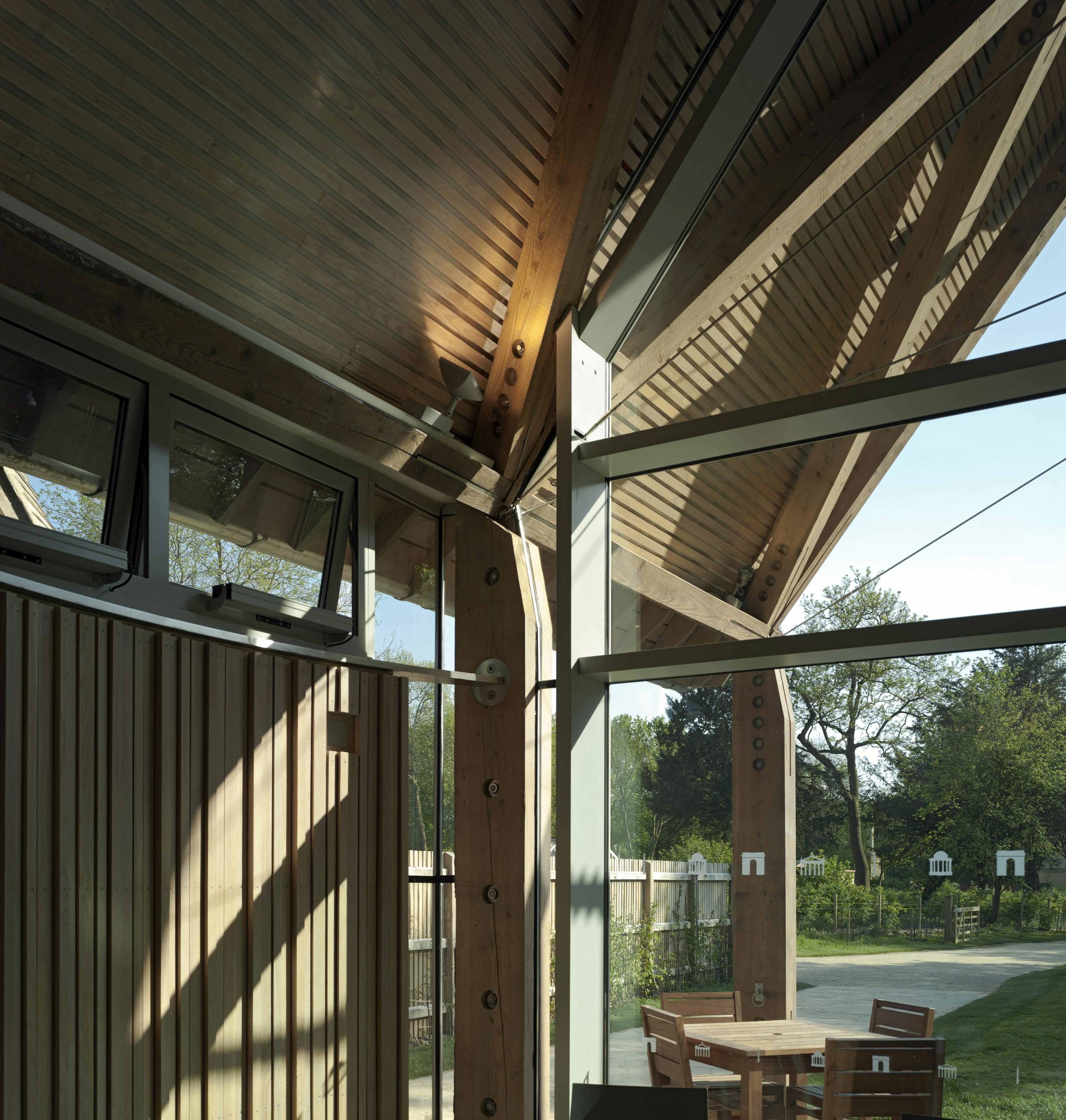 A visitors centre and cafe made with a diagrid roof constructed from larch