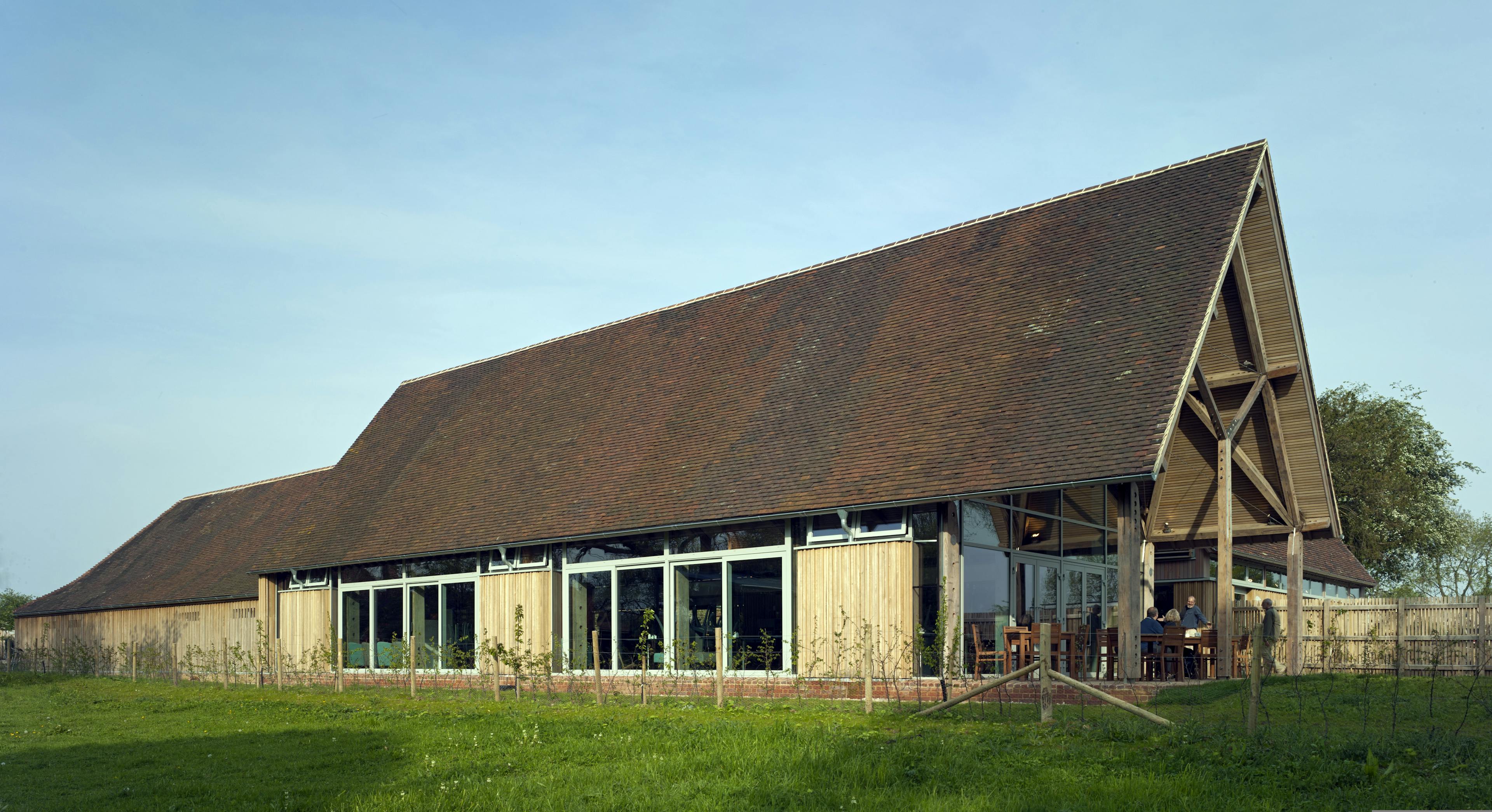 A visitors centre and cafe made with a diagrid roof constructed from larch