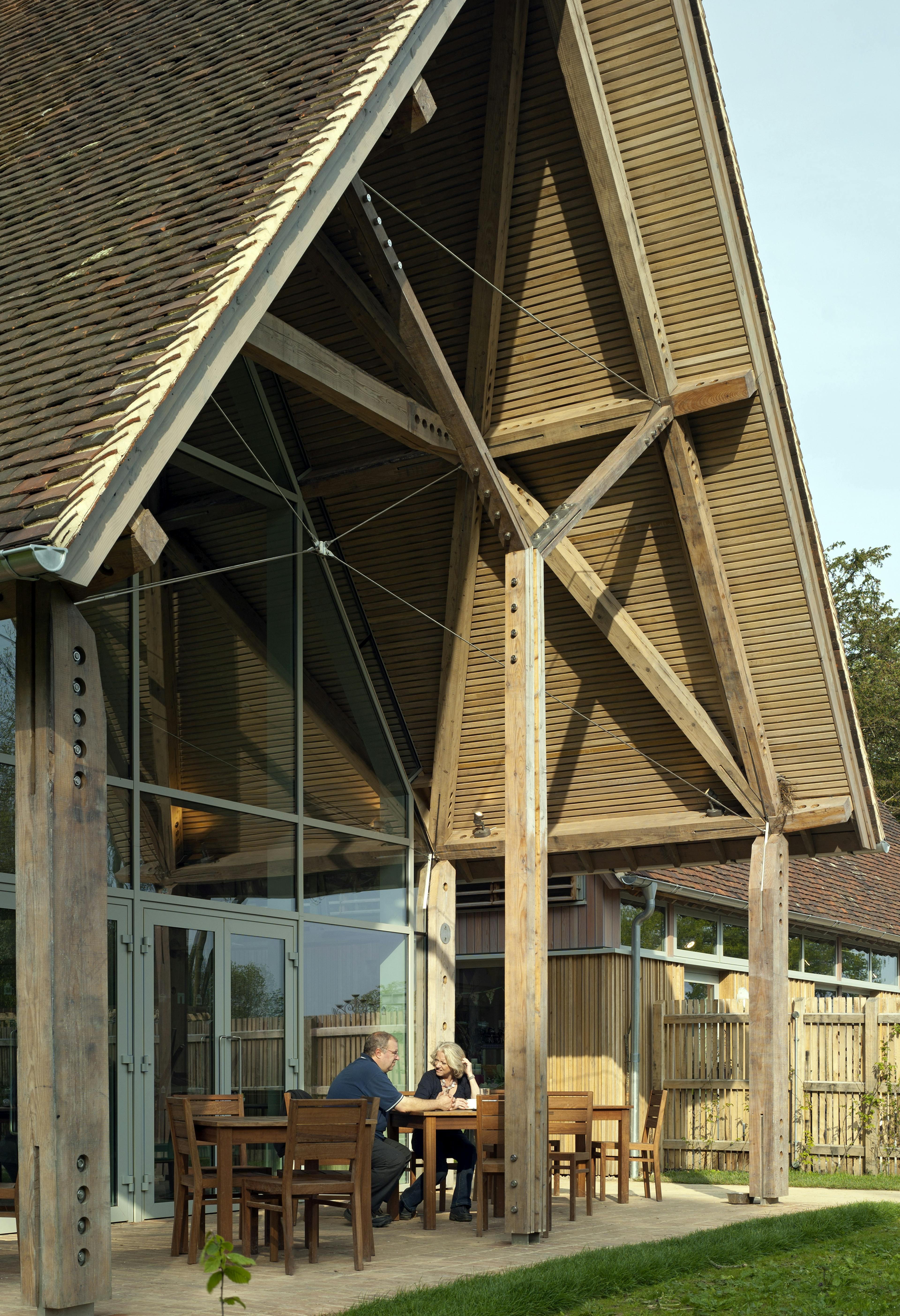 A porch for a visitors centre and cafe made with a diagrid roof constructed from larch