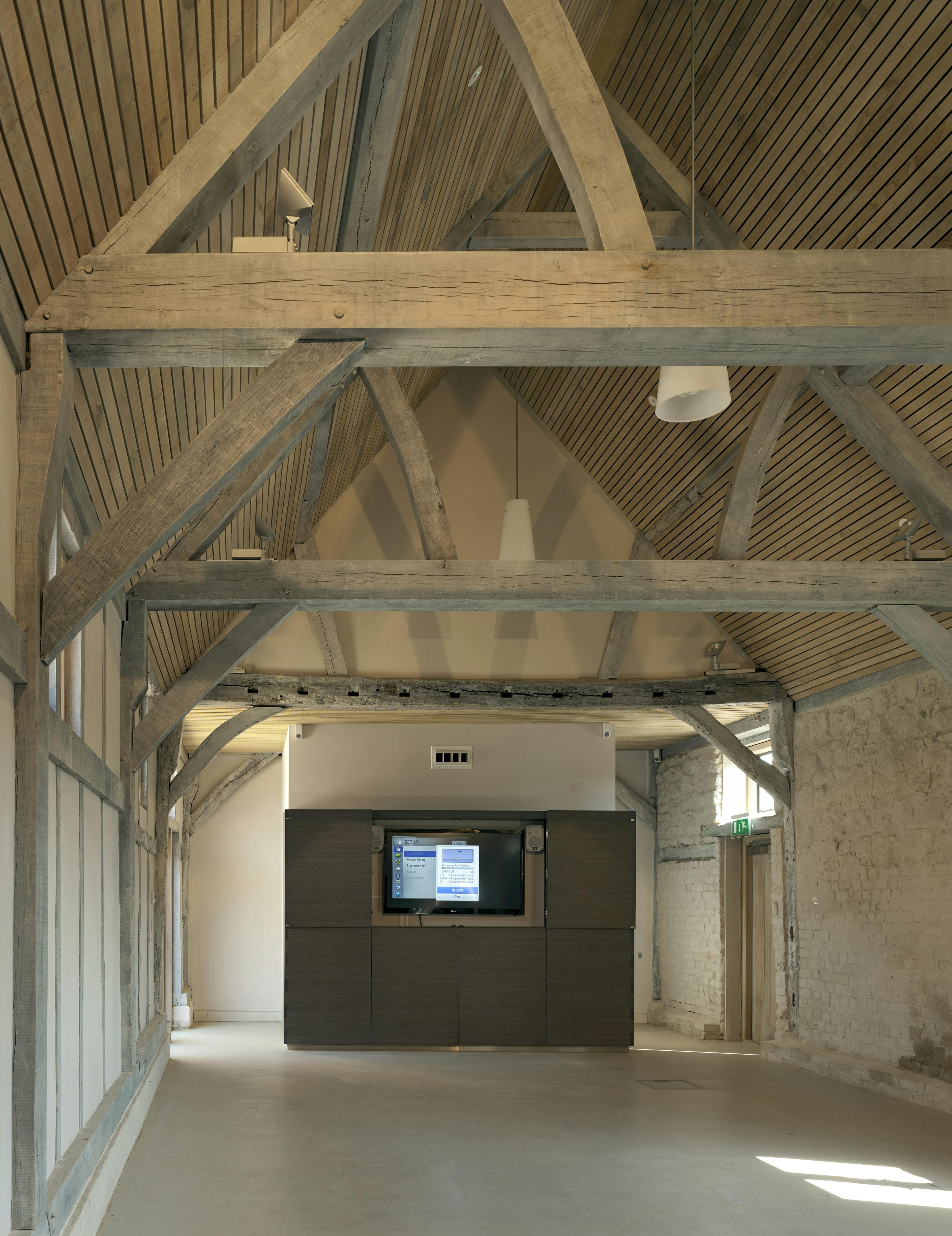 A visitors centre and cafe made with a diagrid roof constructed from larch