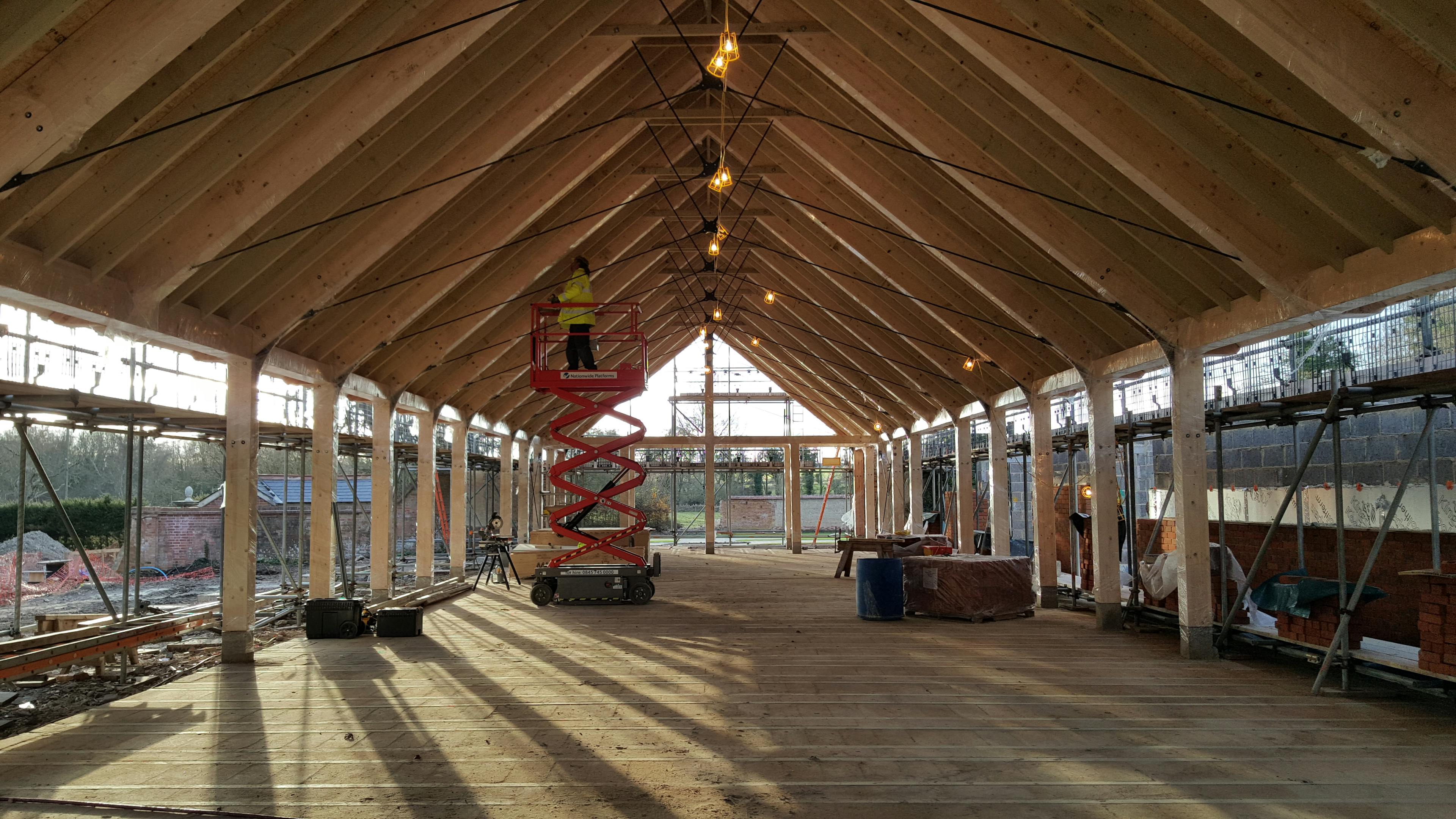 Installation of a timber white spruce glulam wedding barn