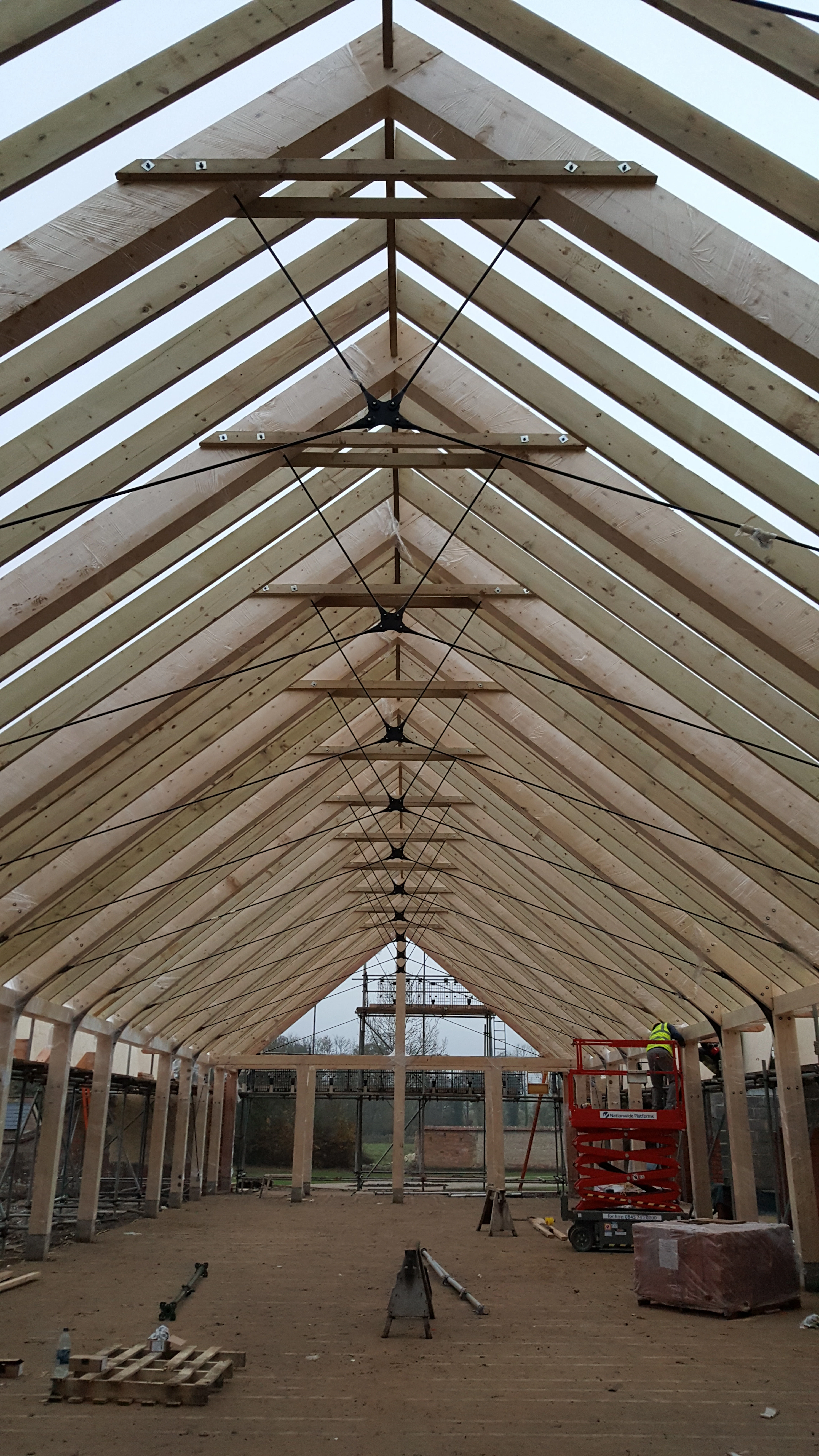 Installation of a timber white spruce glulam wedding barn