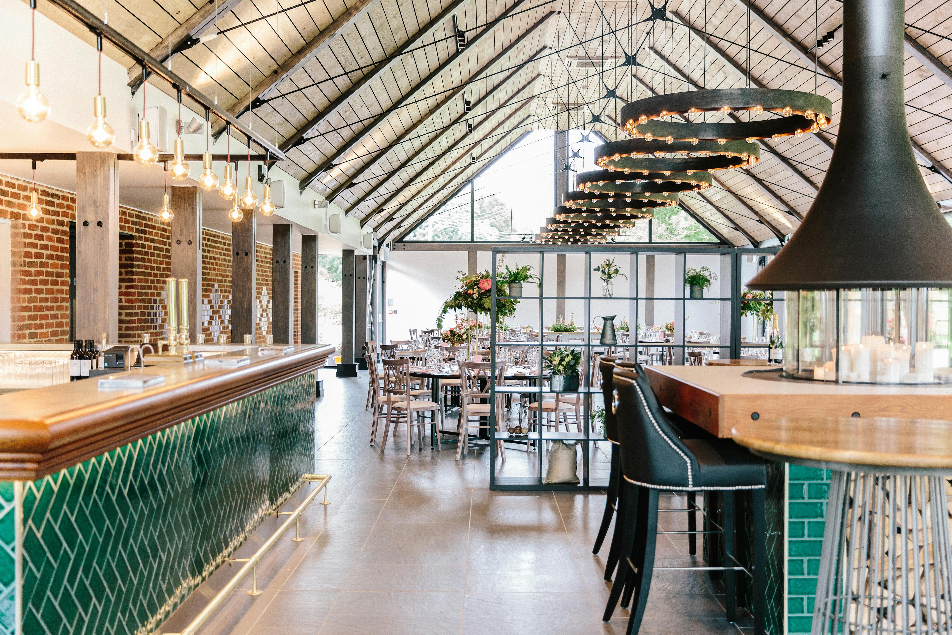 A bar area in a timber white spruce glulam wedding barn