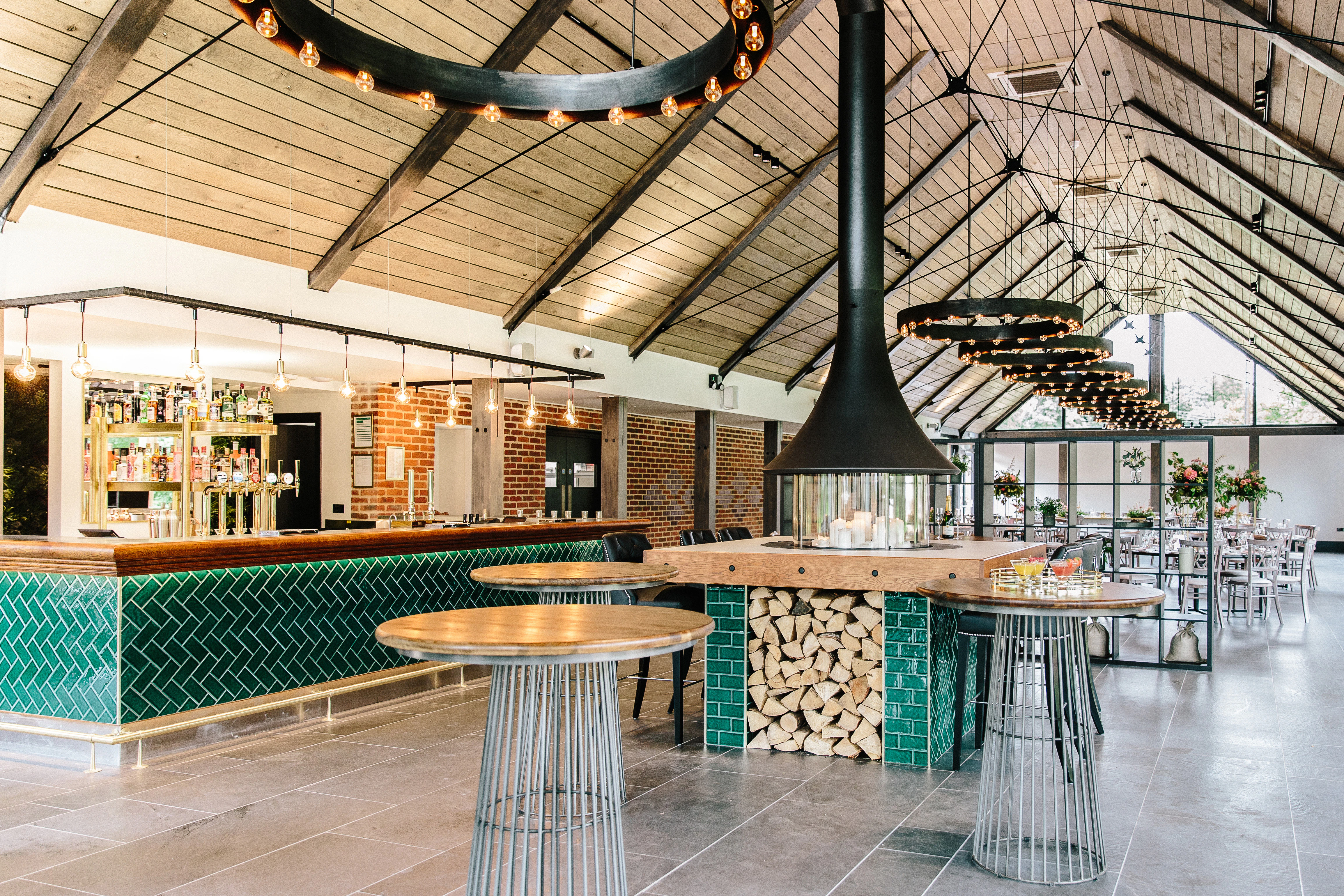 A bar area in a timber white spruce glulam wedding barn