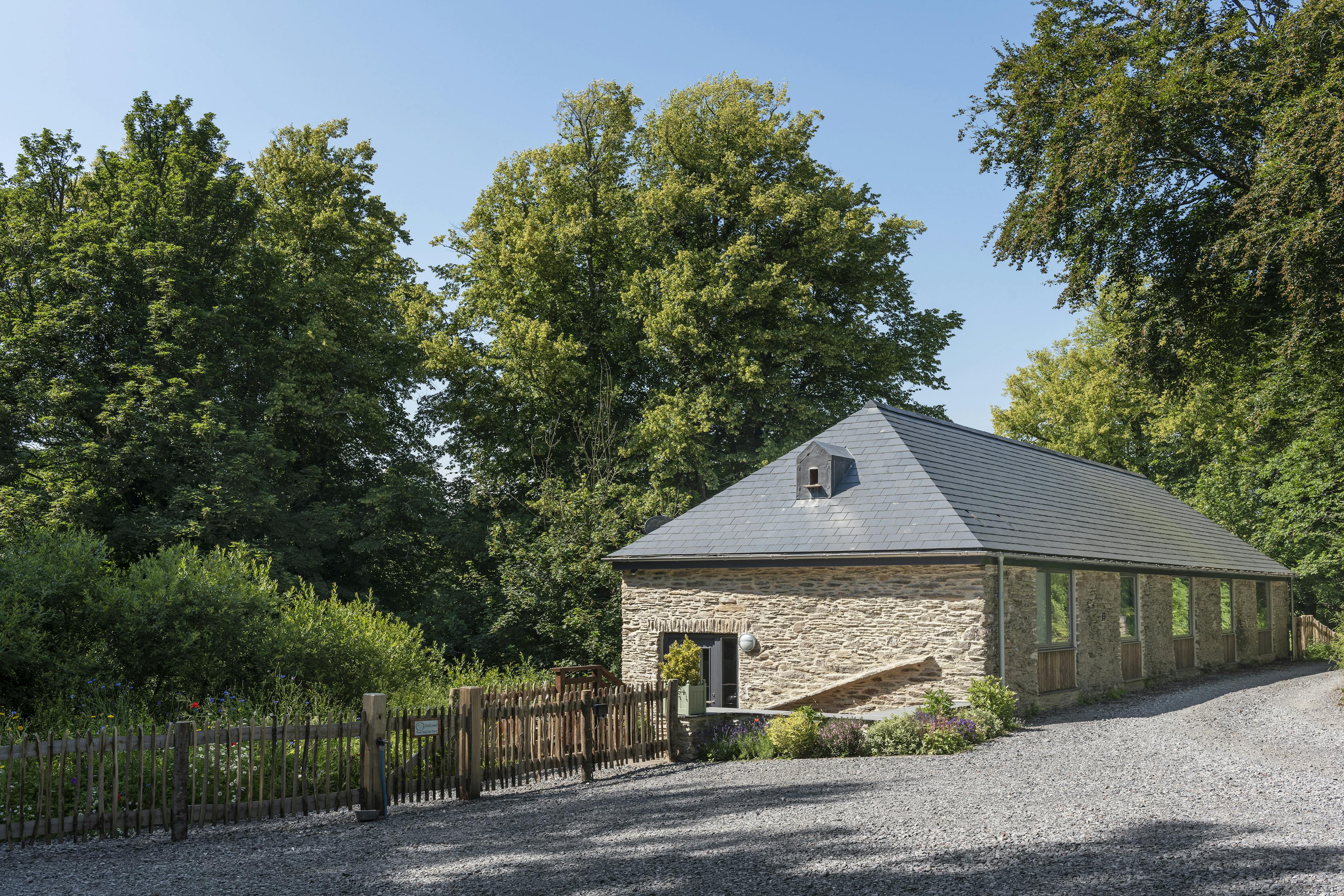 Exterior view of a renovated stone barn