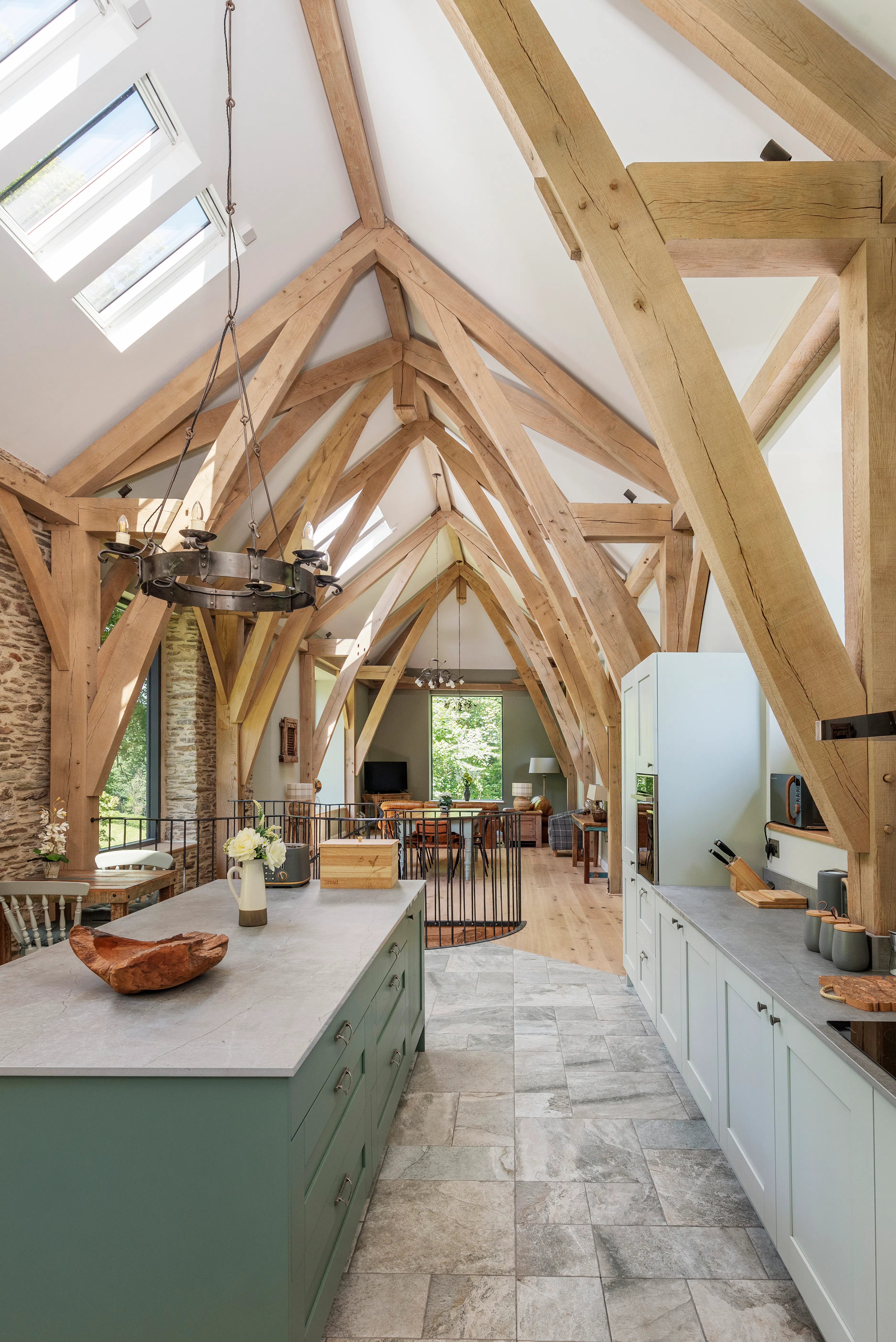 Open-plan living space showcasing a structural oak fram