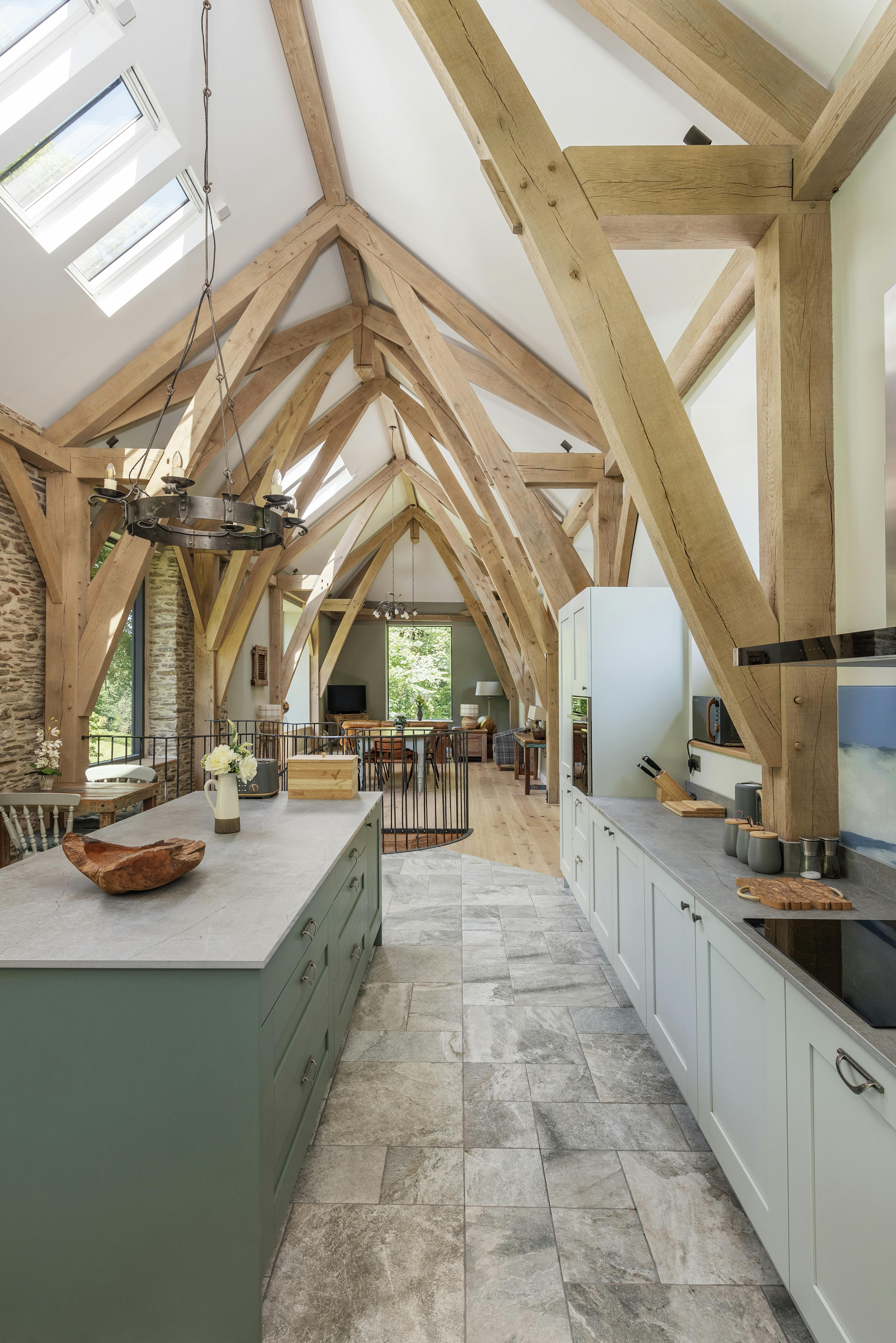 Open-plan living space showcasing a structural oak fram