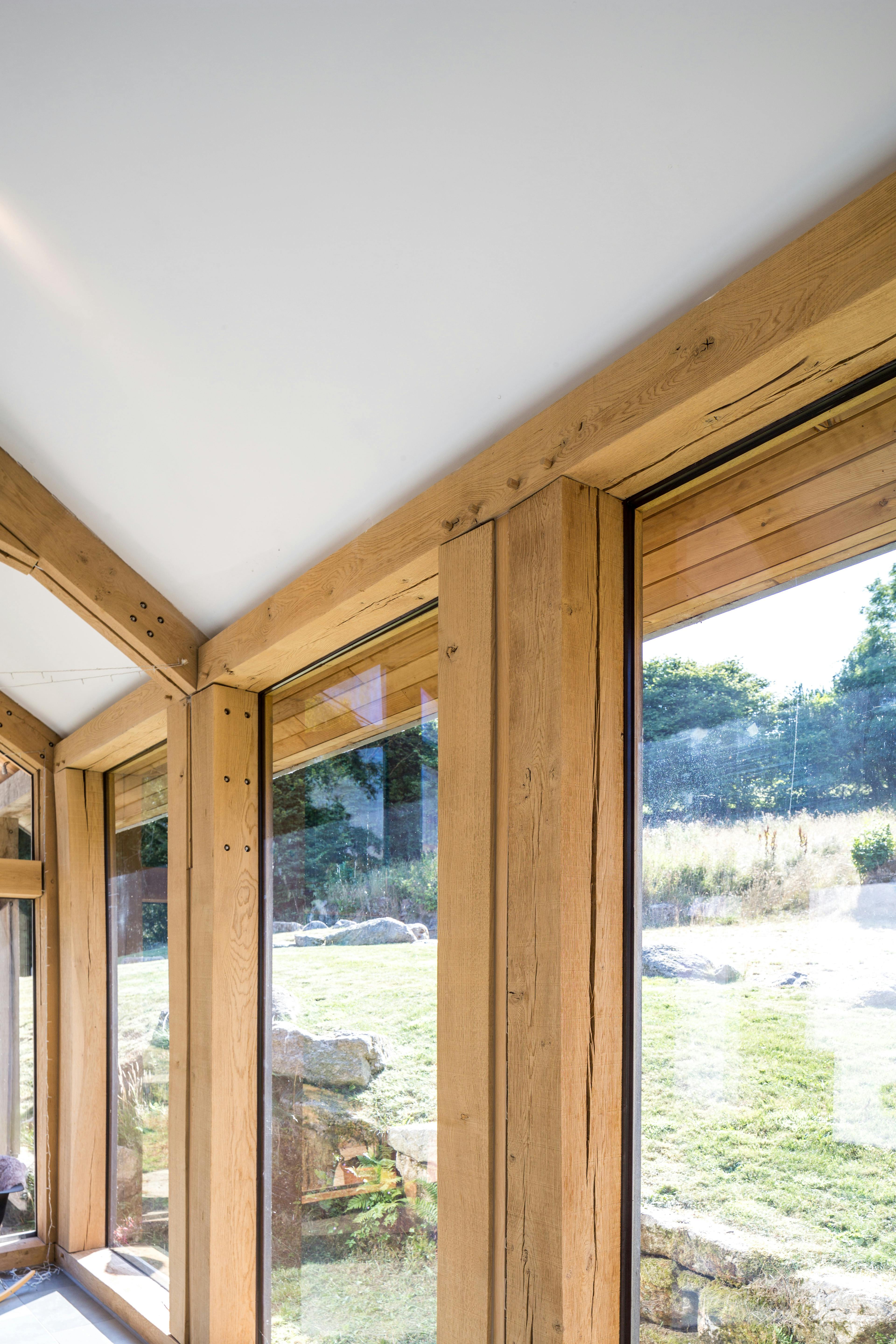 An oak framed living room extension with direct glazing
