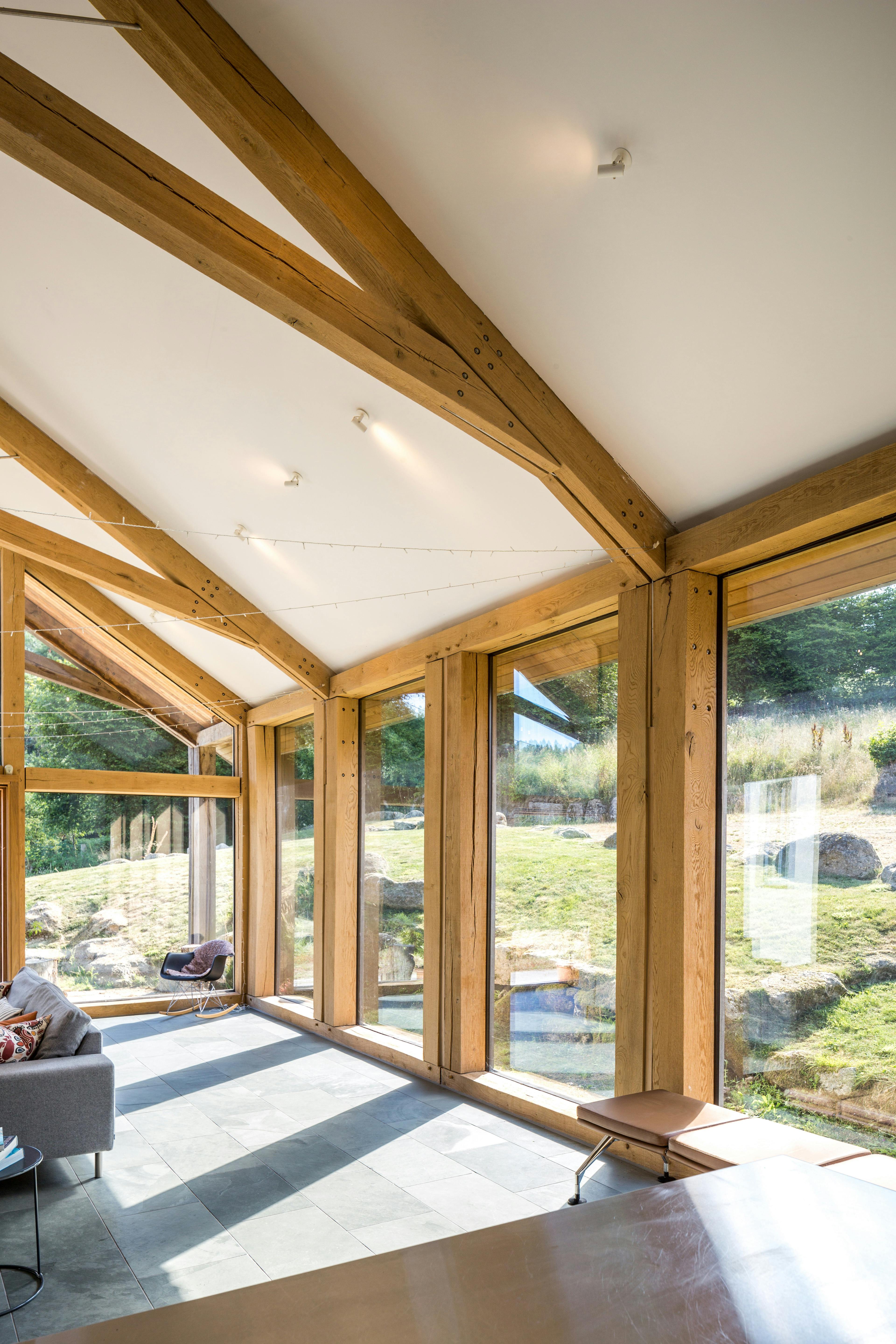 An oak framed living room extension with scissor truss