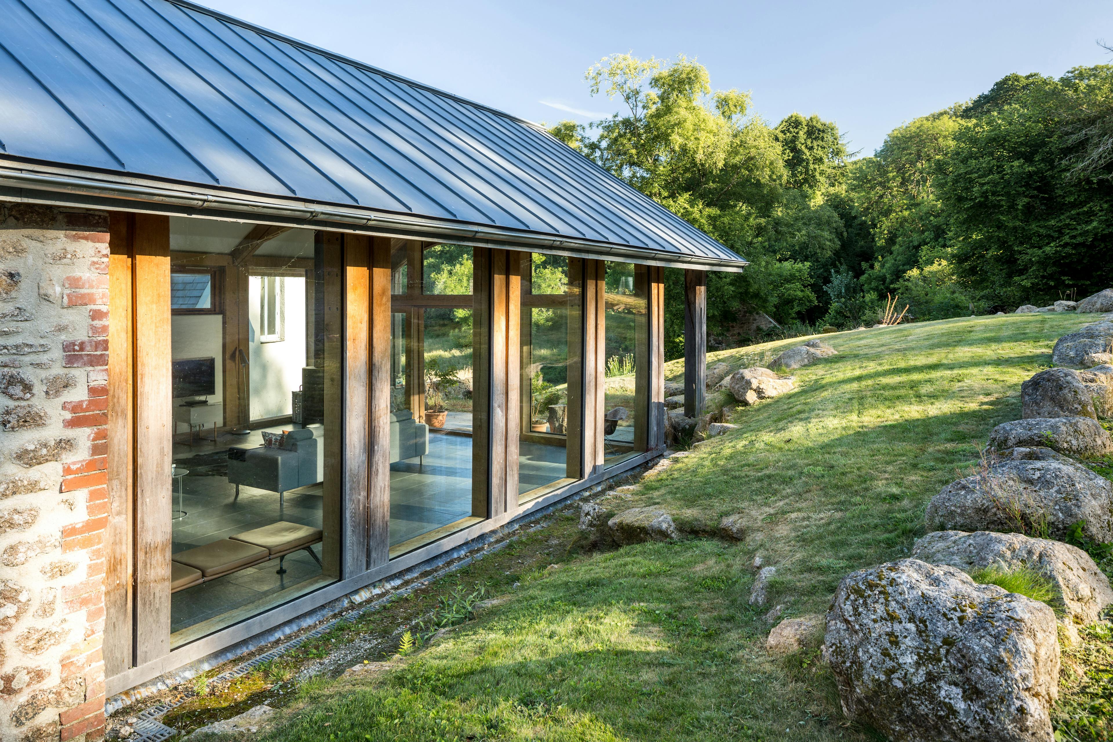 Exterior of an oak framed living room extension with scissor truss