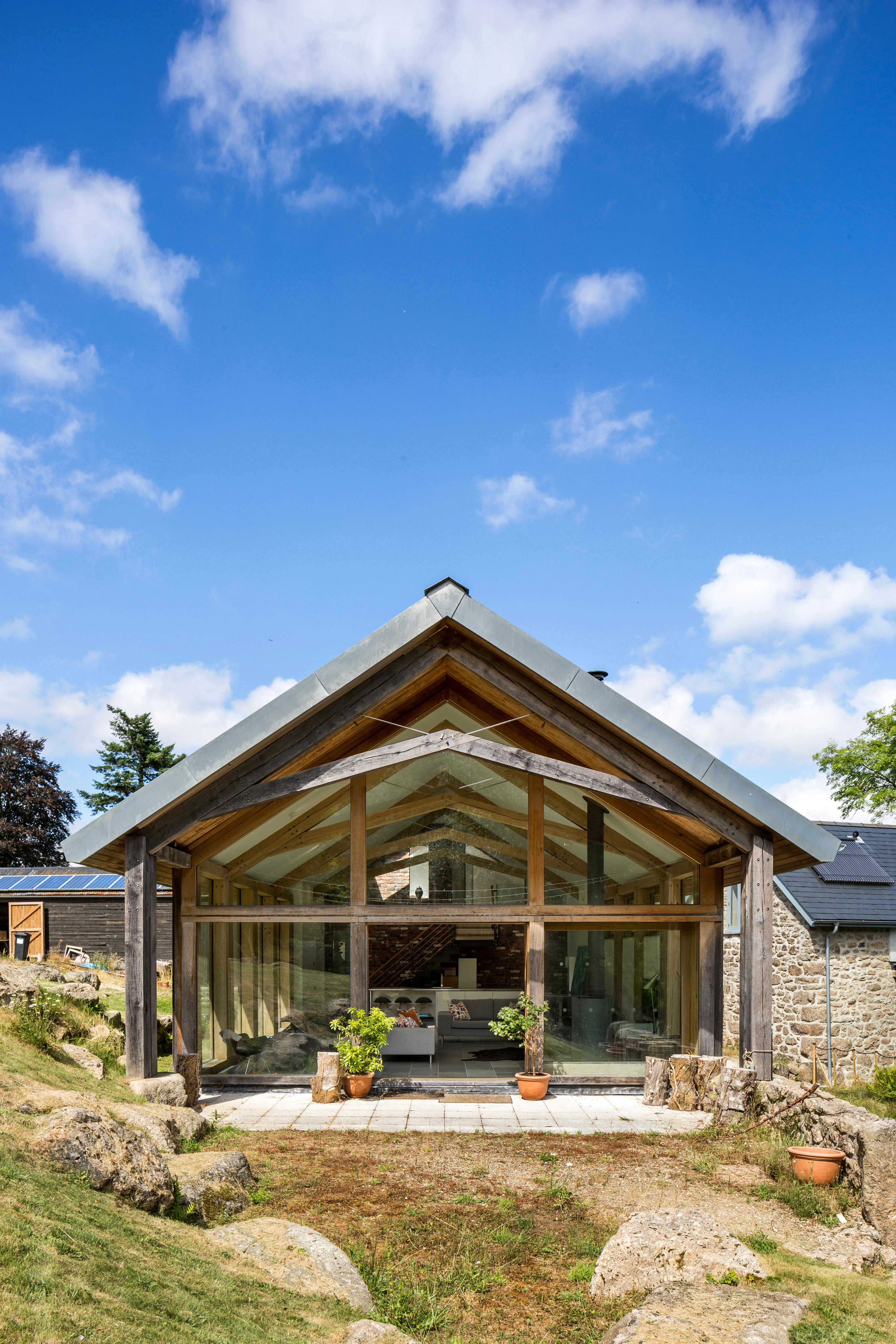 Exterior view of a self-contained, open-plan annex with a structural oak frame