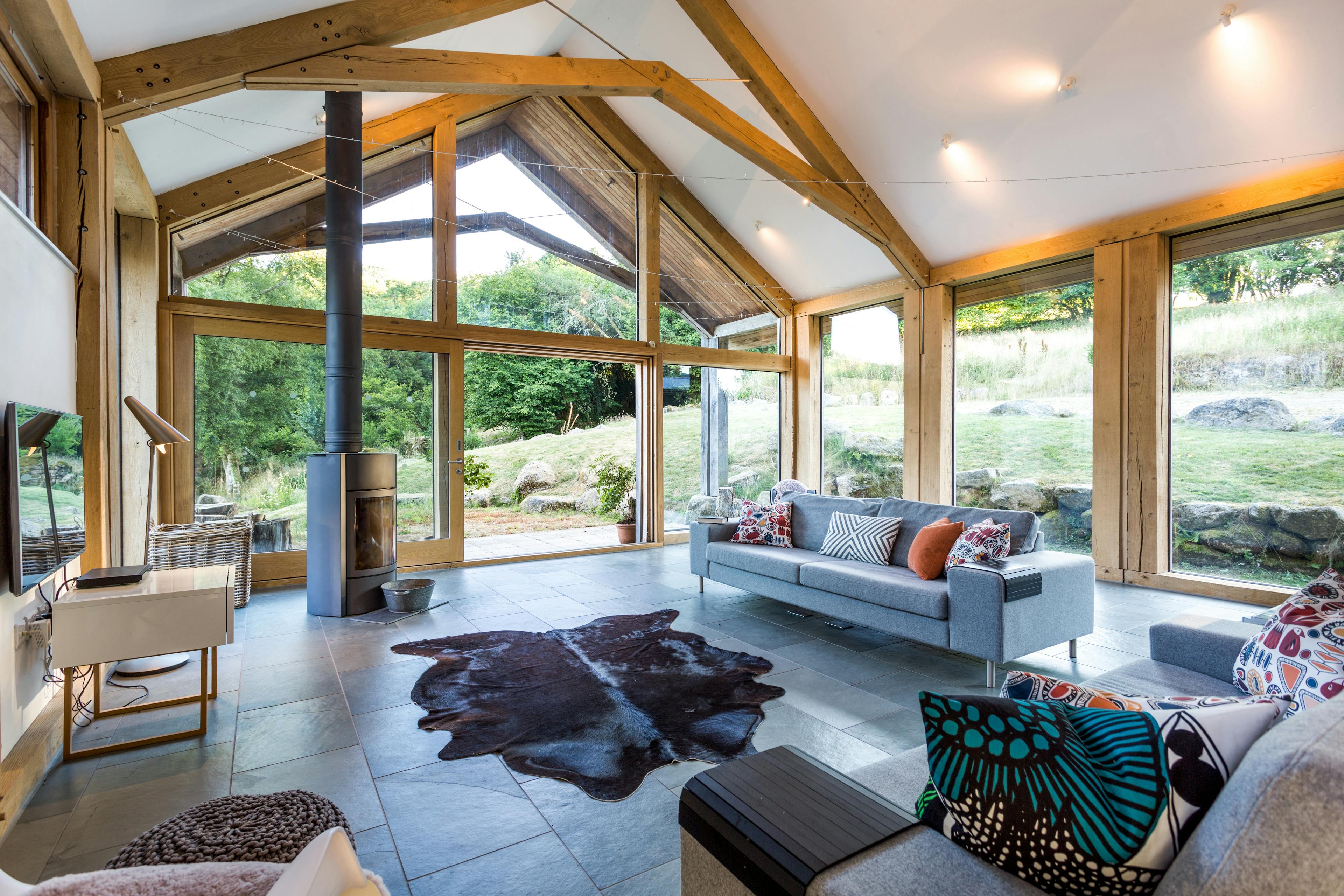 Interior view of an open-plan living space inside an oak-framed annex