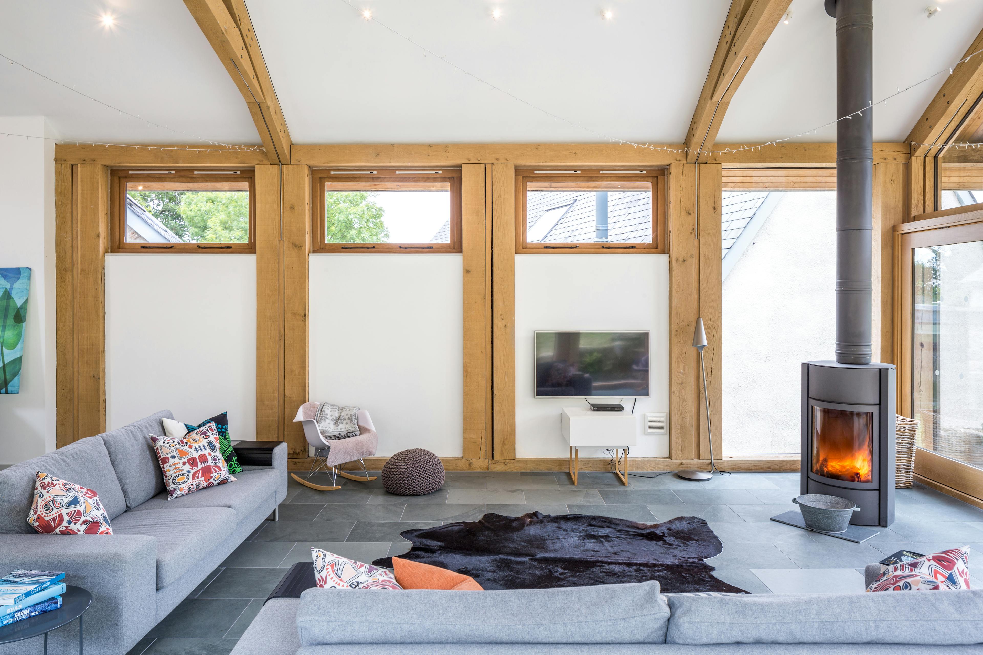 An oak framed living room extension with scissor truss