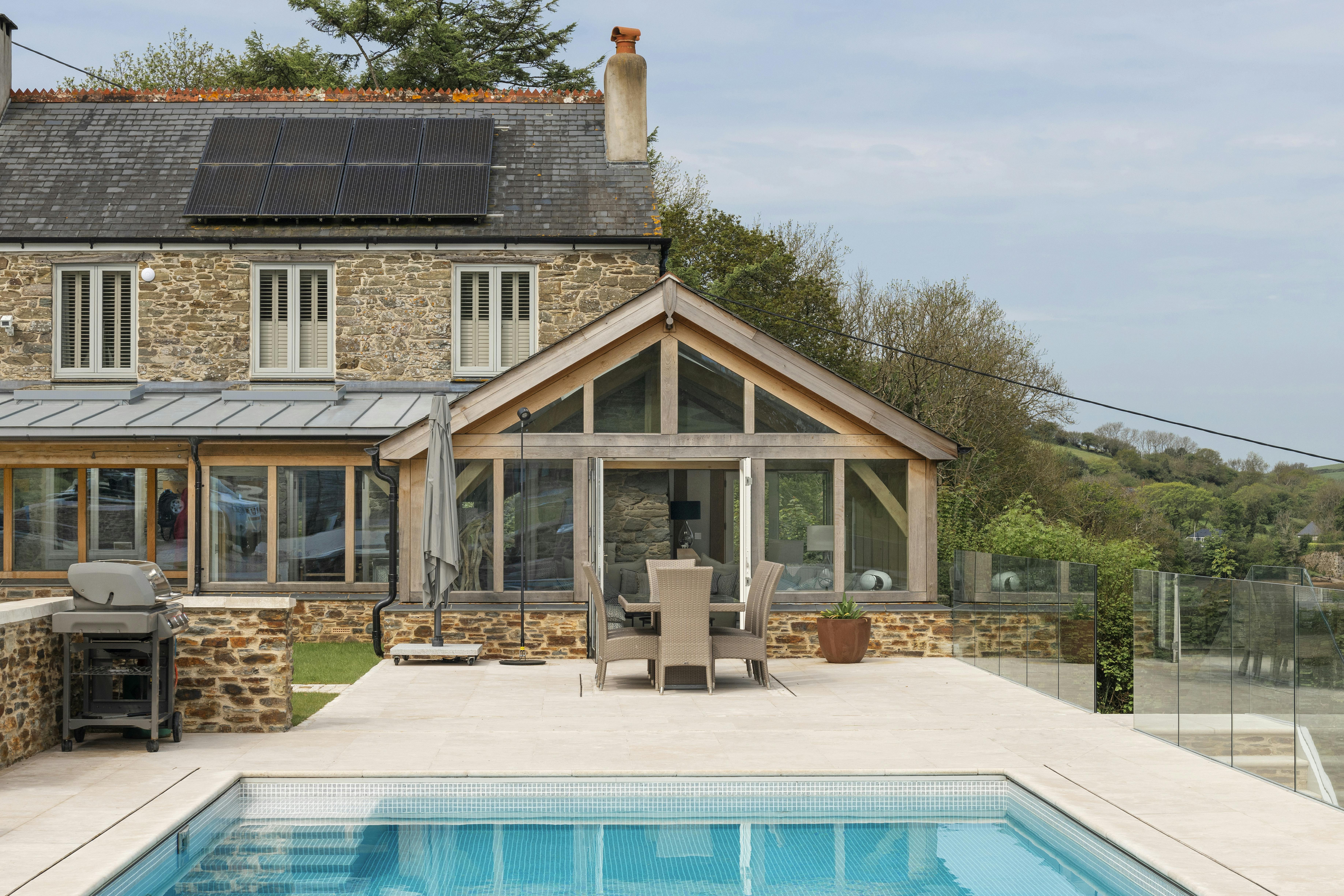 Waterhead_oak extension_walkway_exterior_renovation_patio_swimming pool_closer in