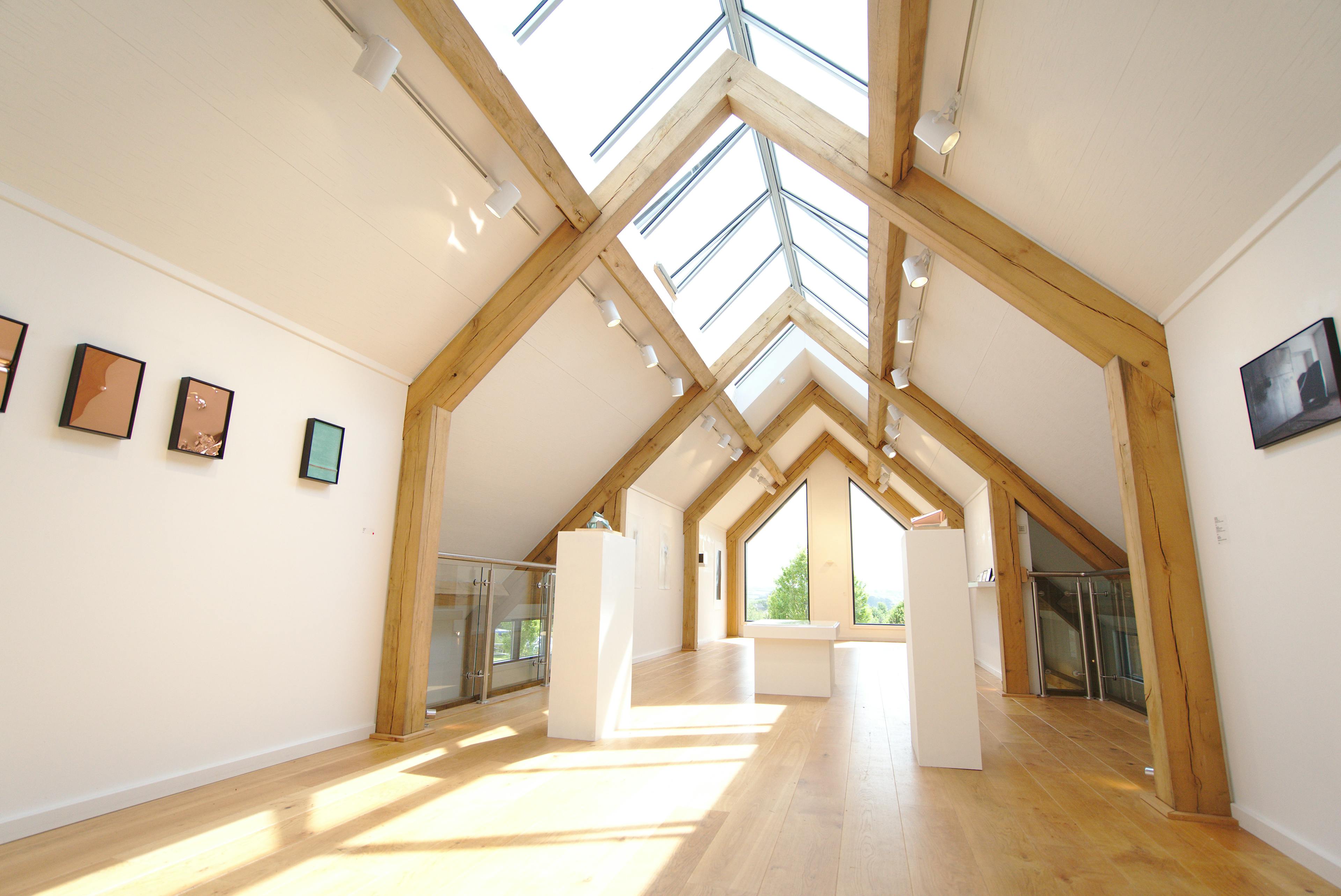 Interior view of a timber-framed gallery space