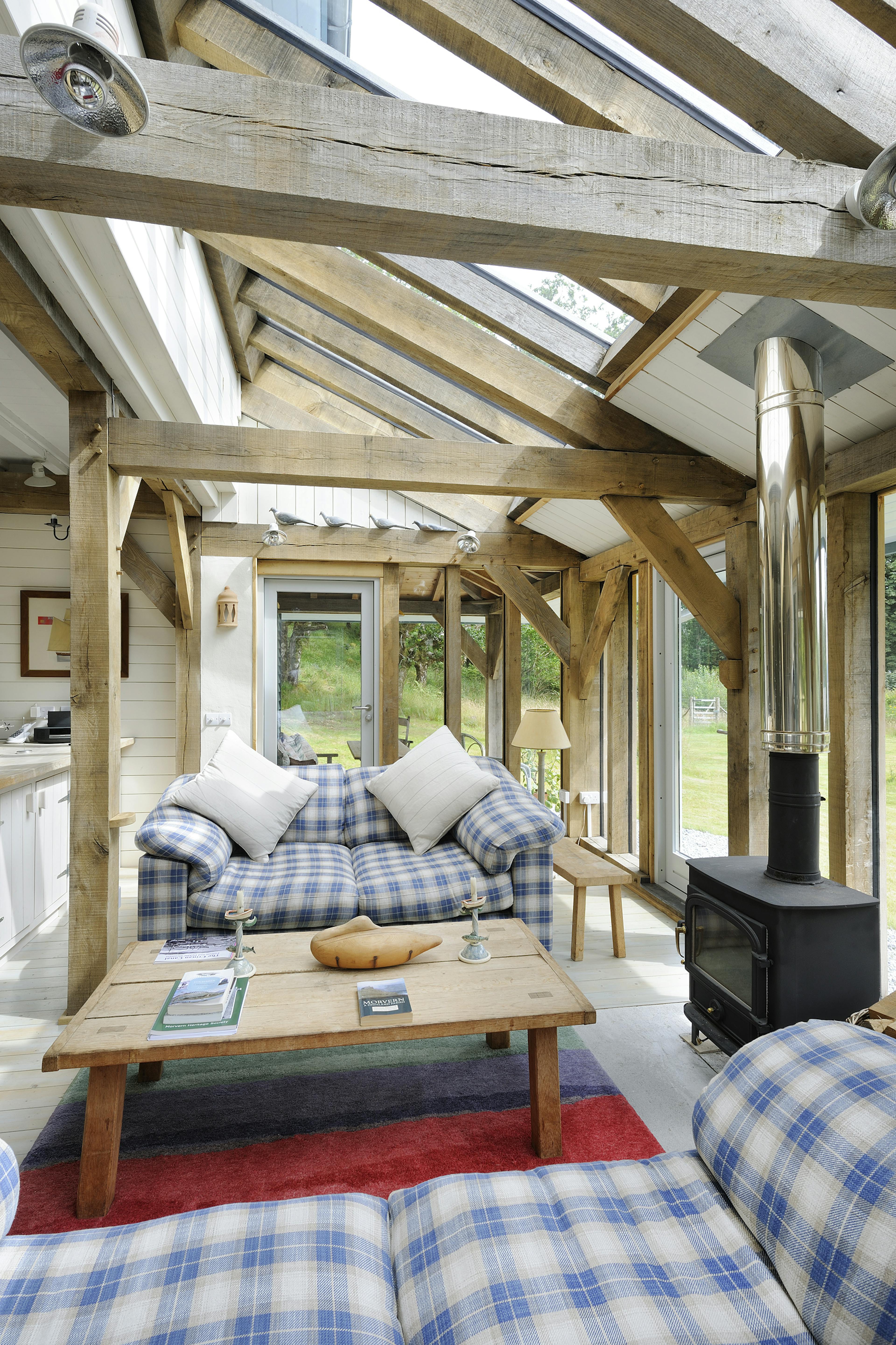 Interior view of an open-plan, oak-framed living space