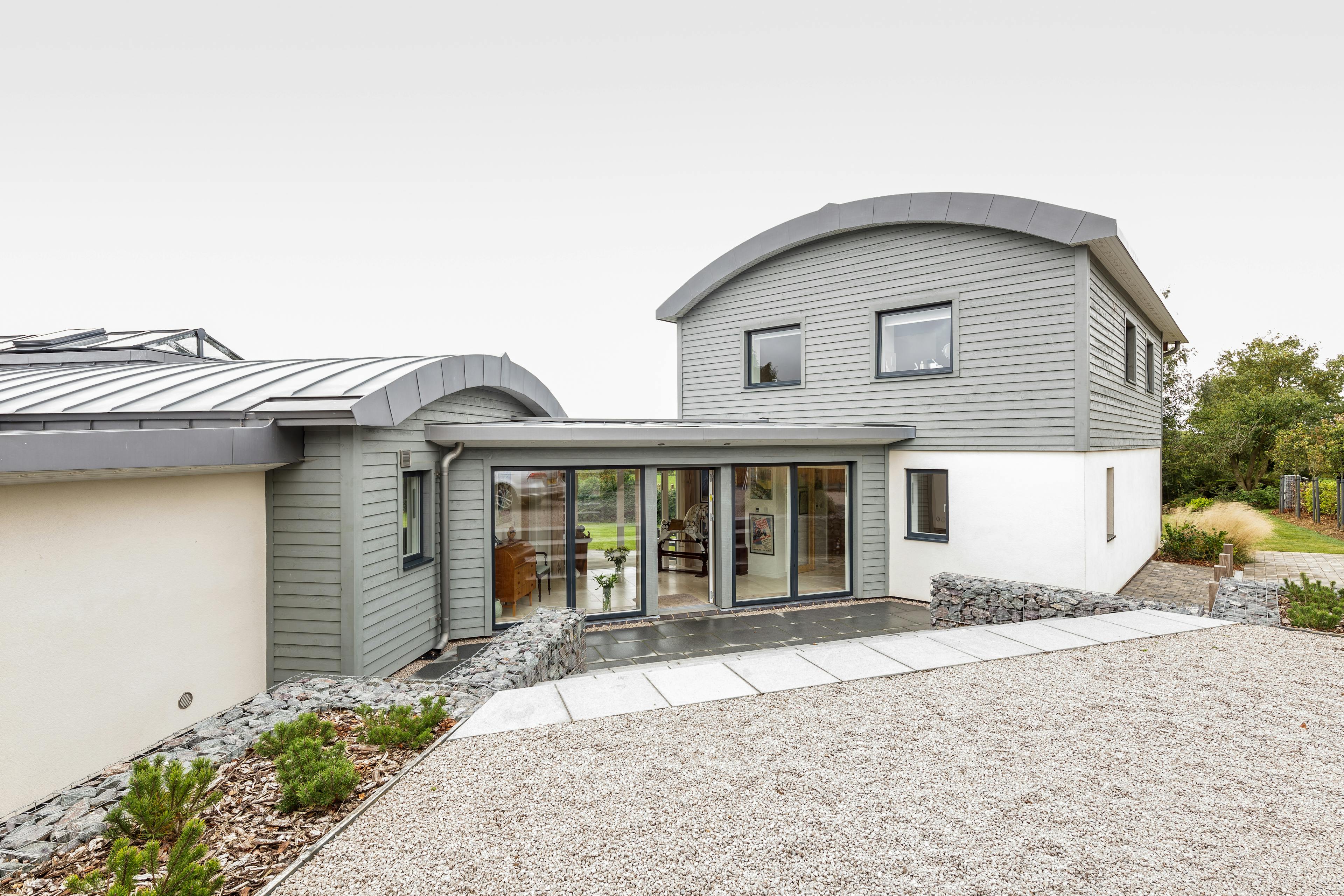 Entrance to a newly built contemporary family home featuring an internal structural Douglas fir frame