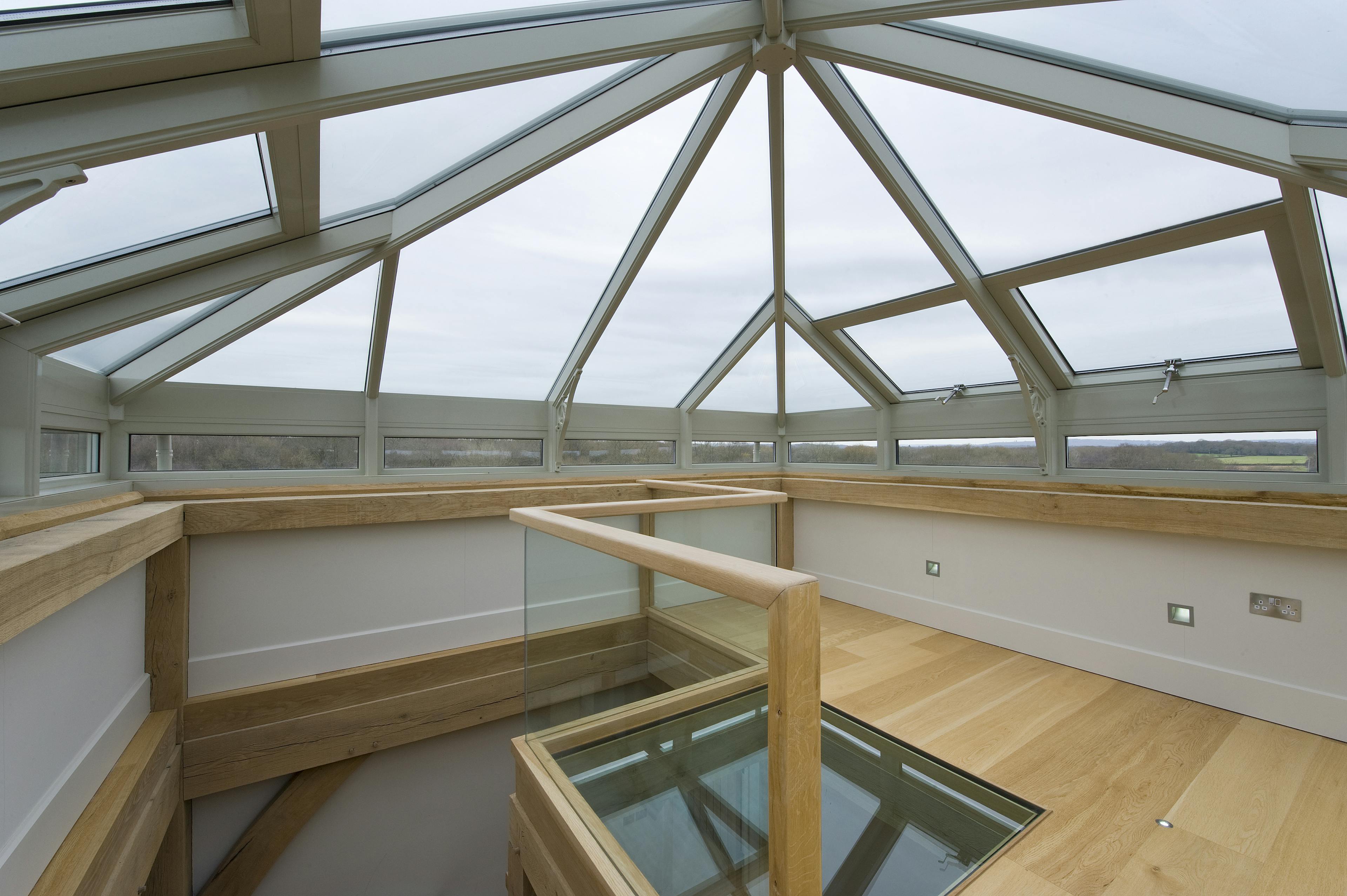 Interior view of a fully glazed tower offering 360-degree panoramic views