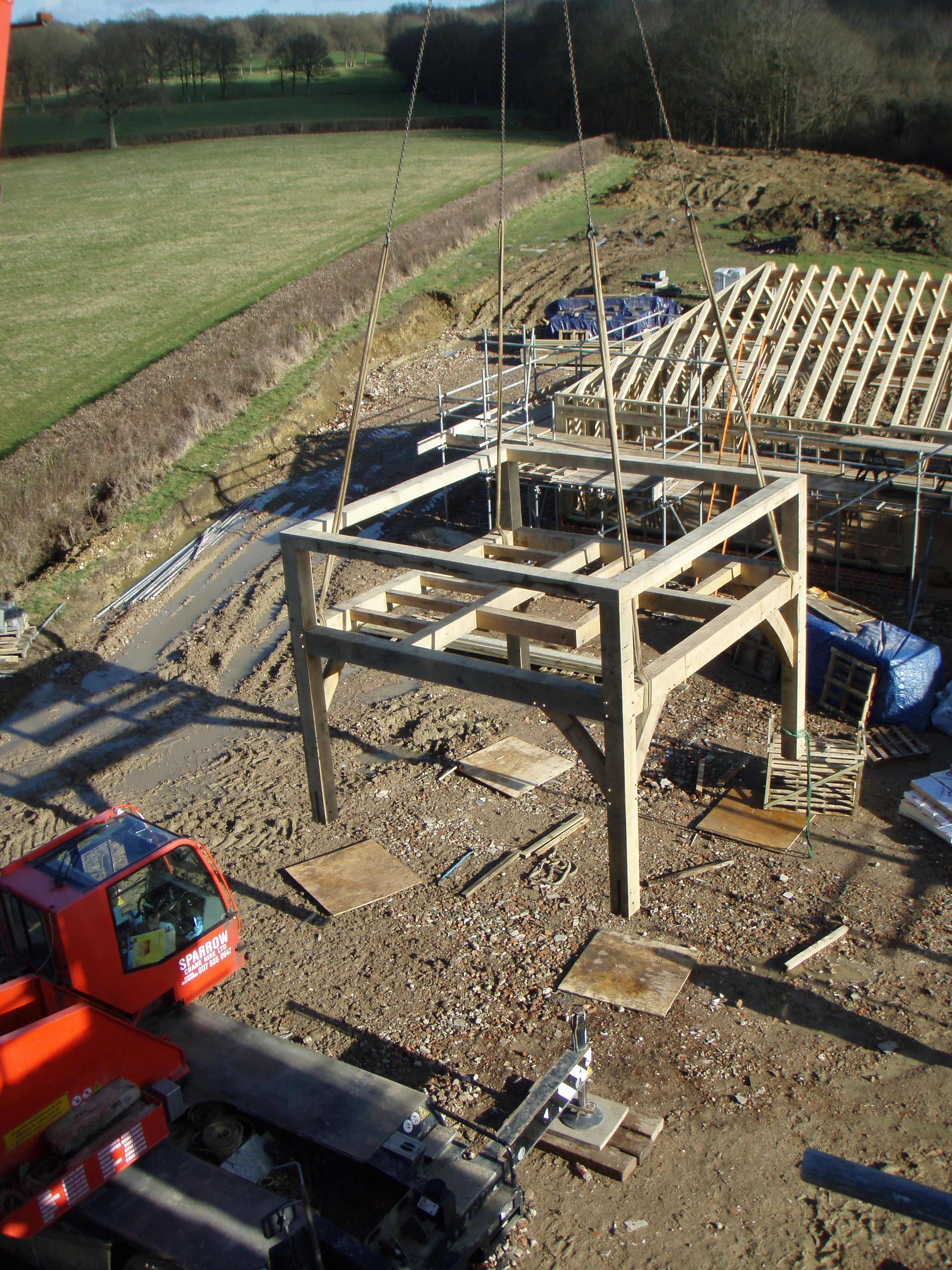 Lifting a preassembled oak-framed structure into place on-site