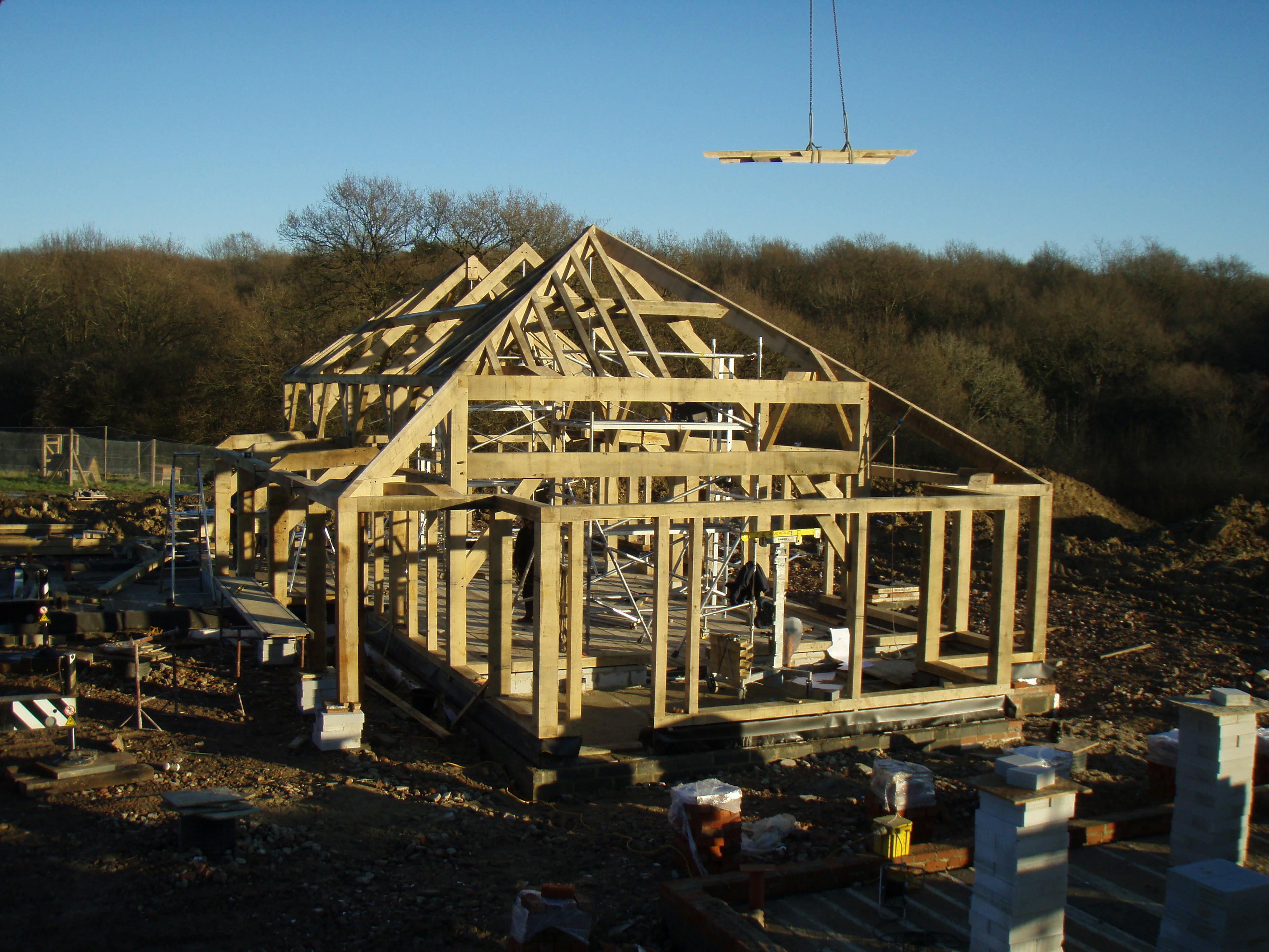 Image of an oak frame being installed on-site