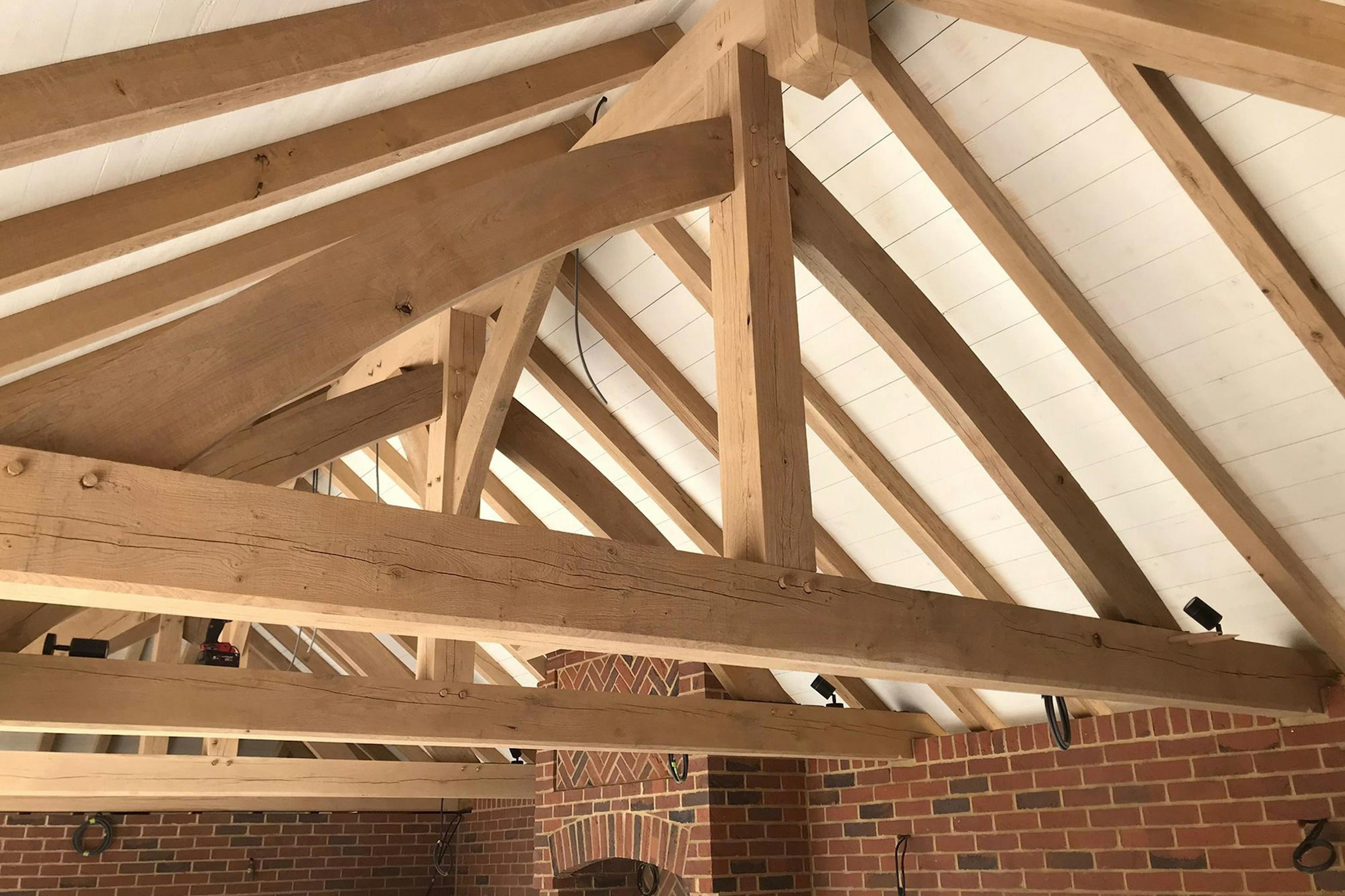 The oak frame with an Adam truss for an outdoor bar and kitchen