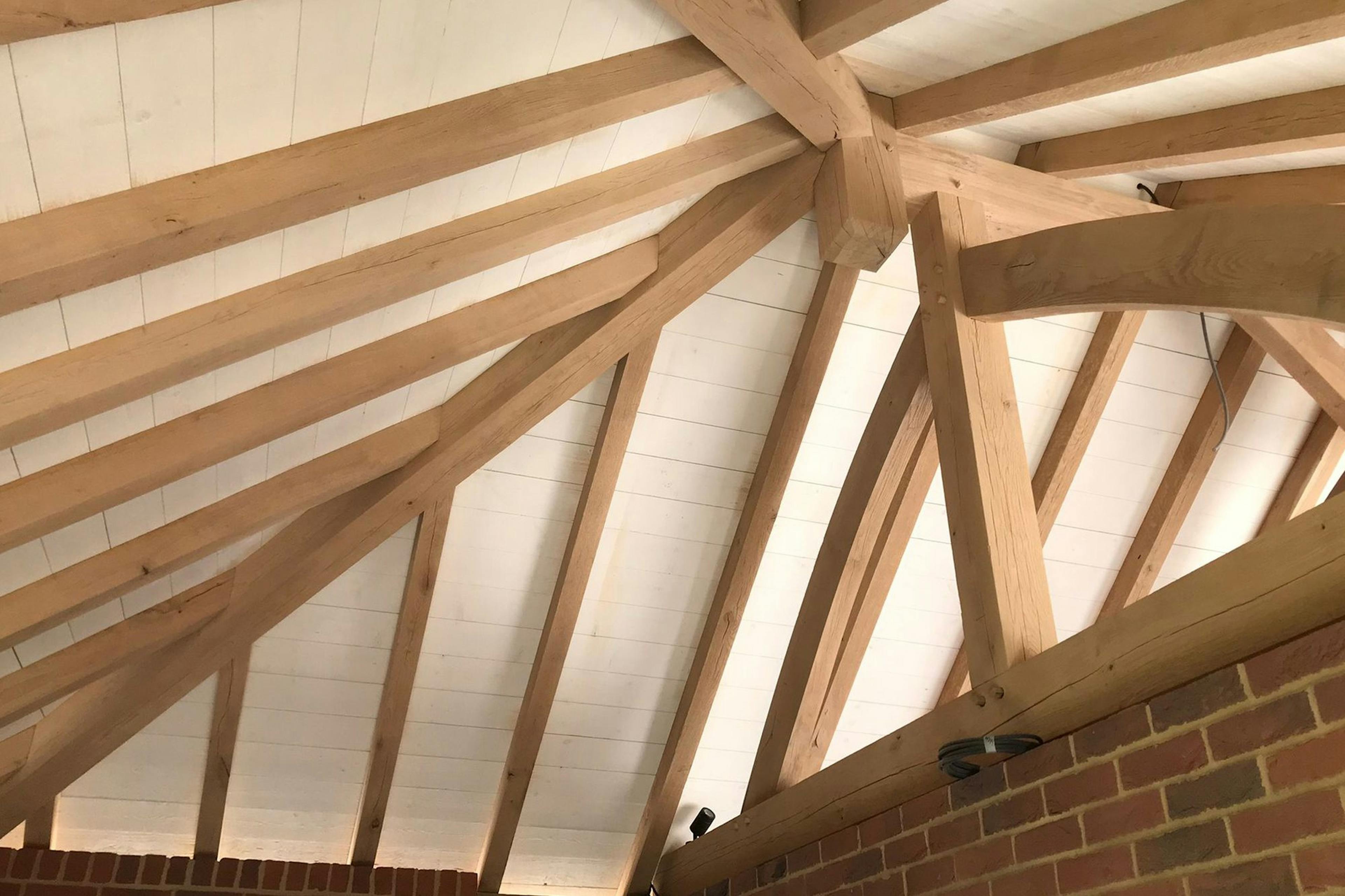 The oak frame with an Adam truss for an outdoor bar and kitchen