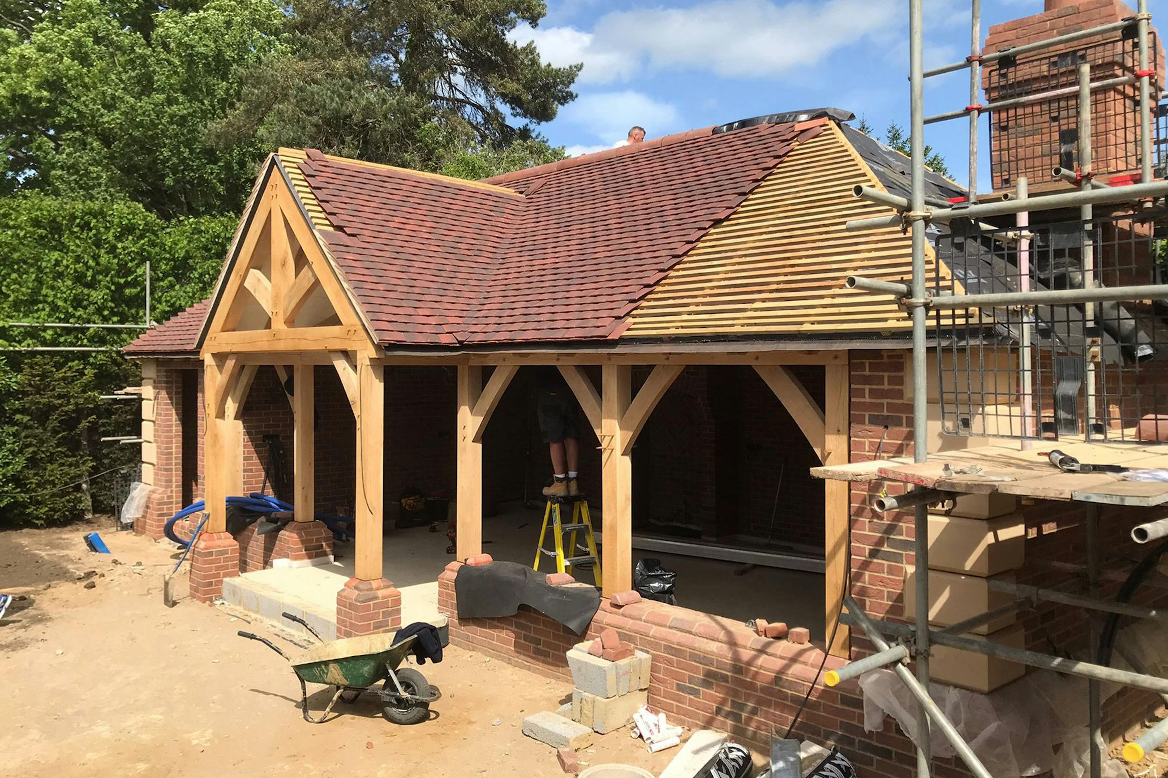 Construction of an oak framed outdoor bar and kitchen