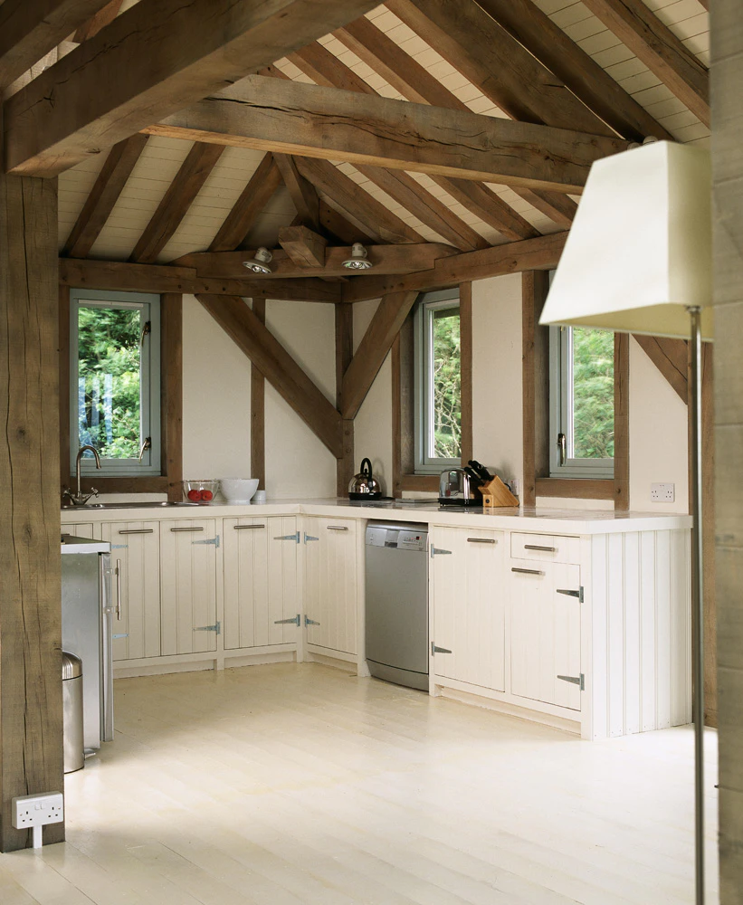 Interior view of an oak-framed farmhouse-style kitchen