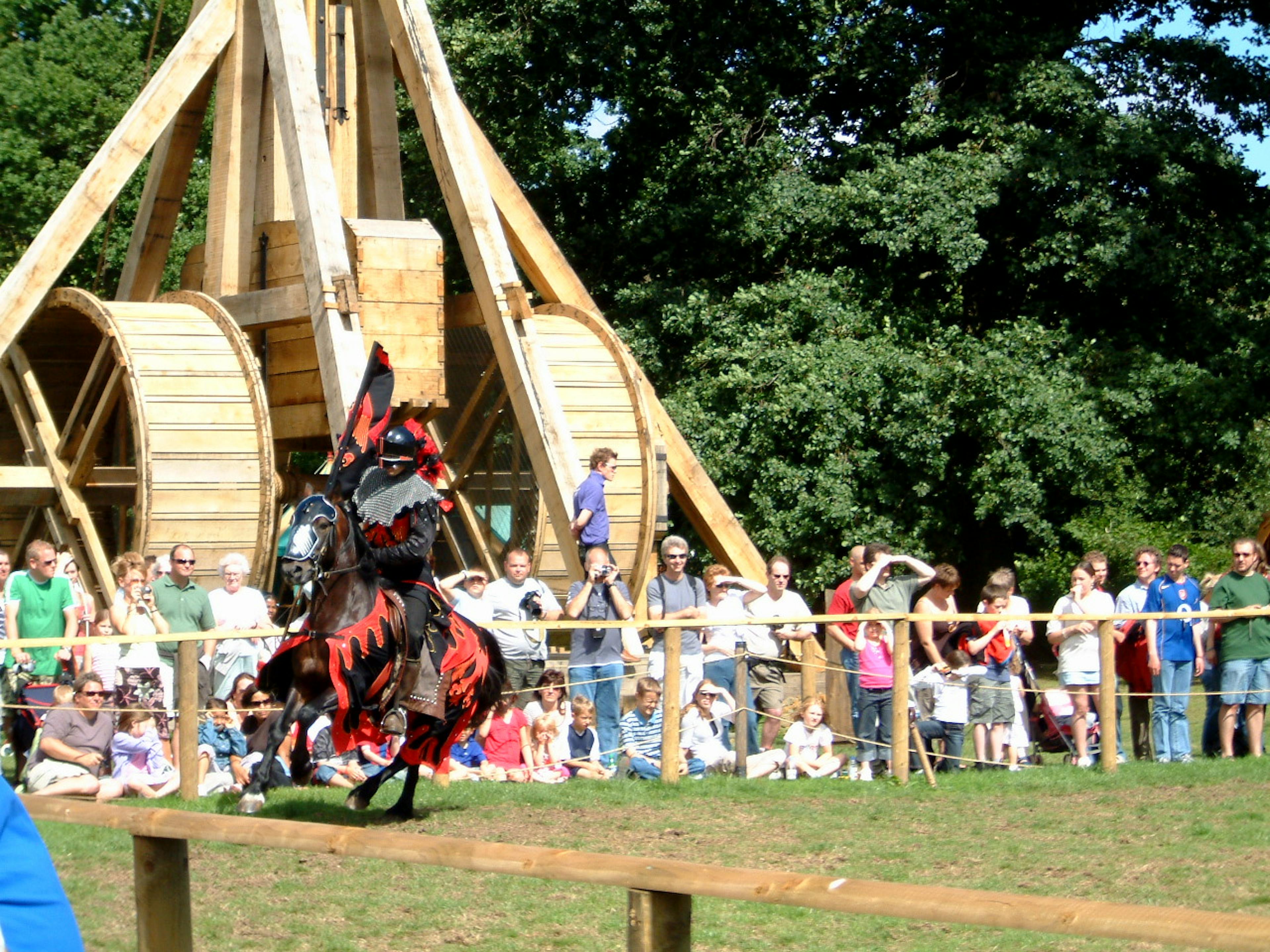 Recreated trebuchet making its debut at the Warwick Castle Jousting Show with crowd