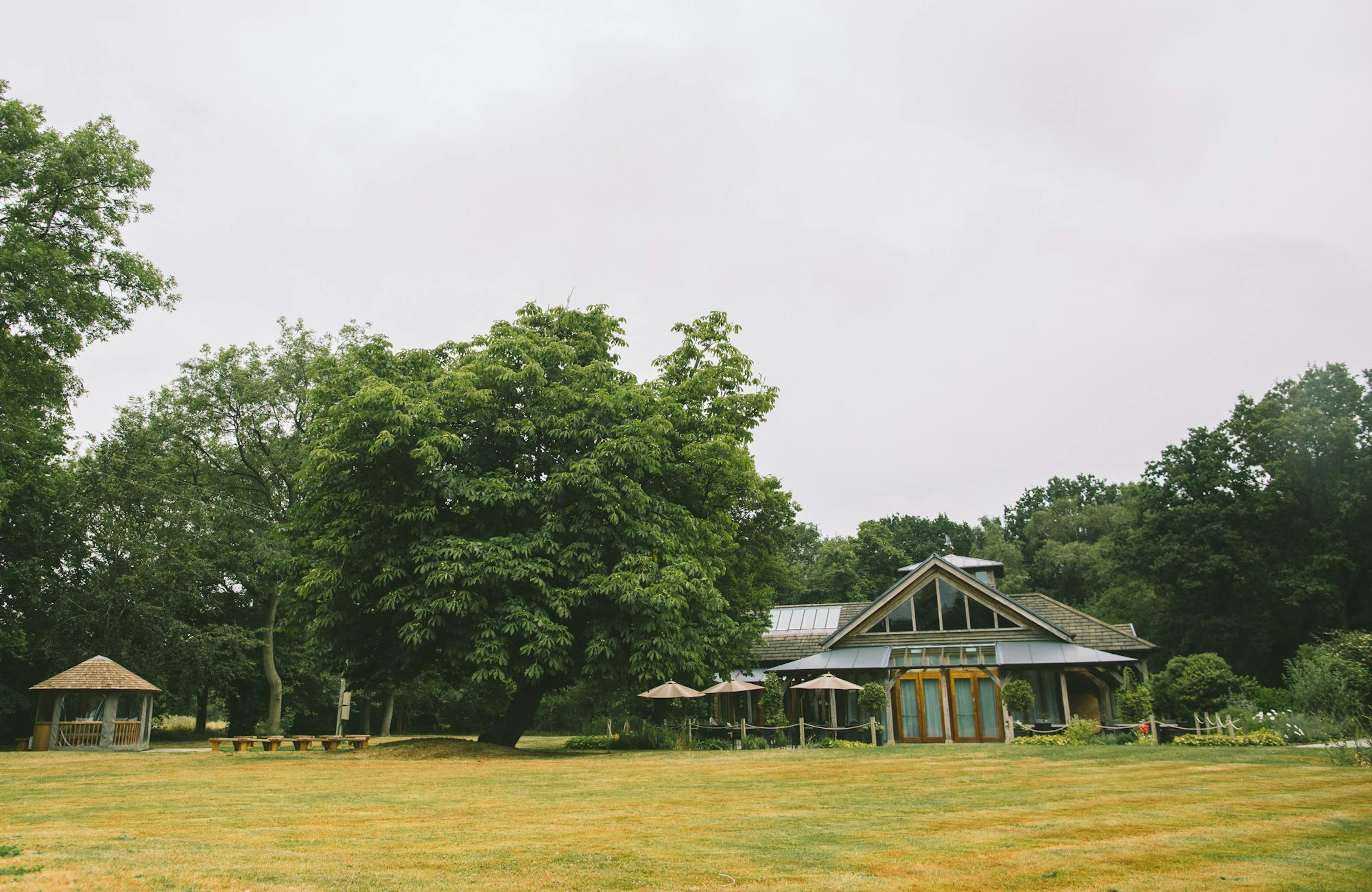 Exterior view of an oak-framed wedding barn set in the countryside