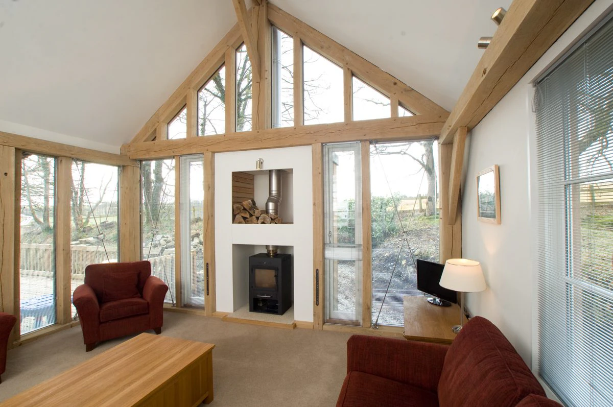 Interior view of an oak-framed extension added to the side of a Victorian-style home