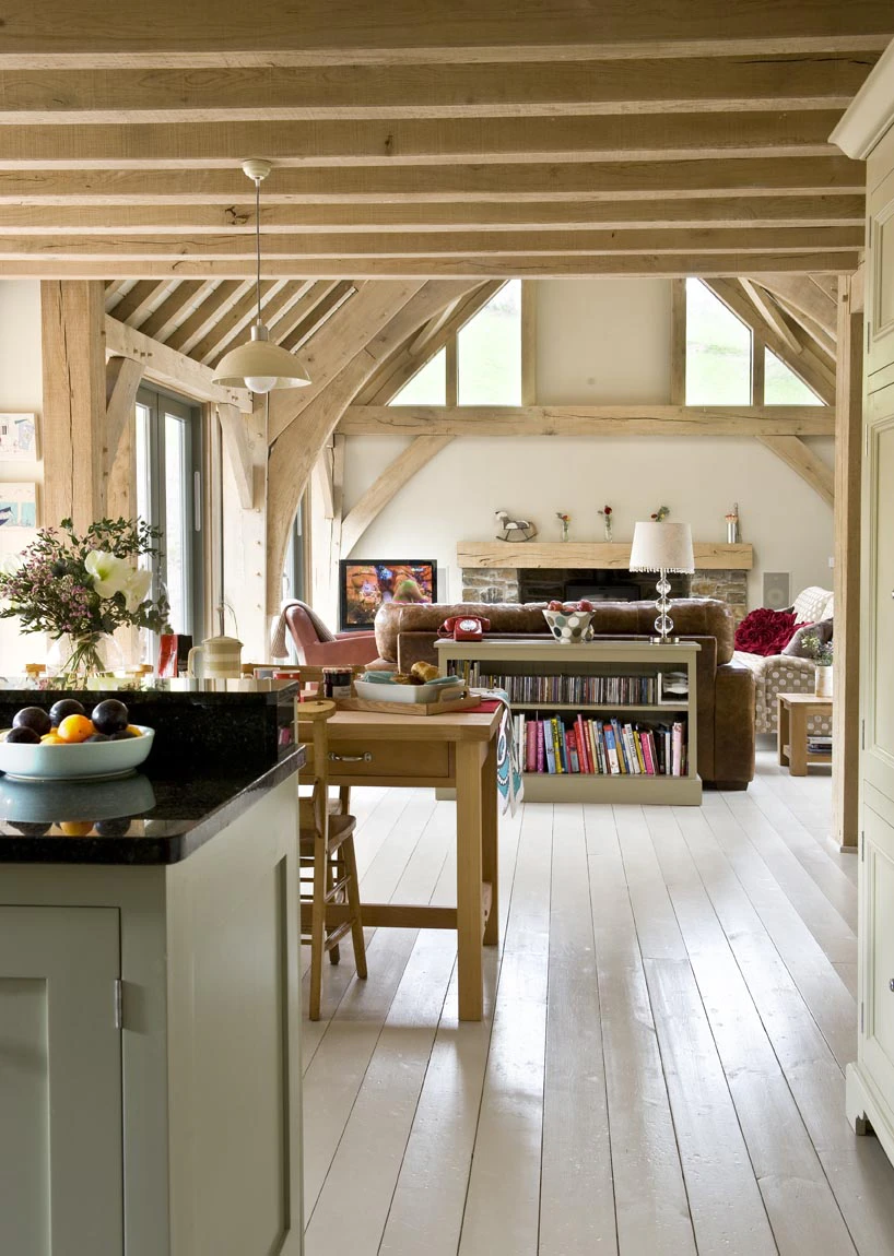 Interior view of an open-plan living space with vaulted ceilings