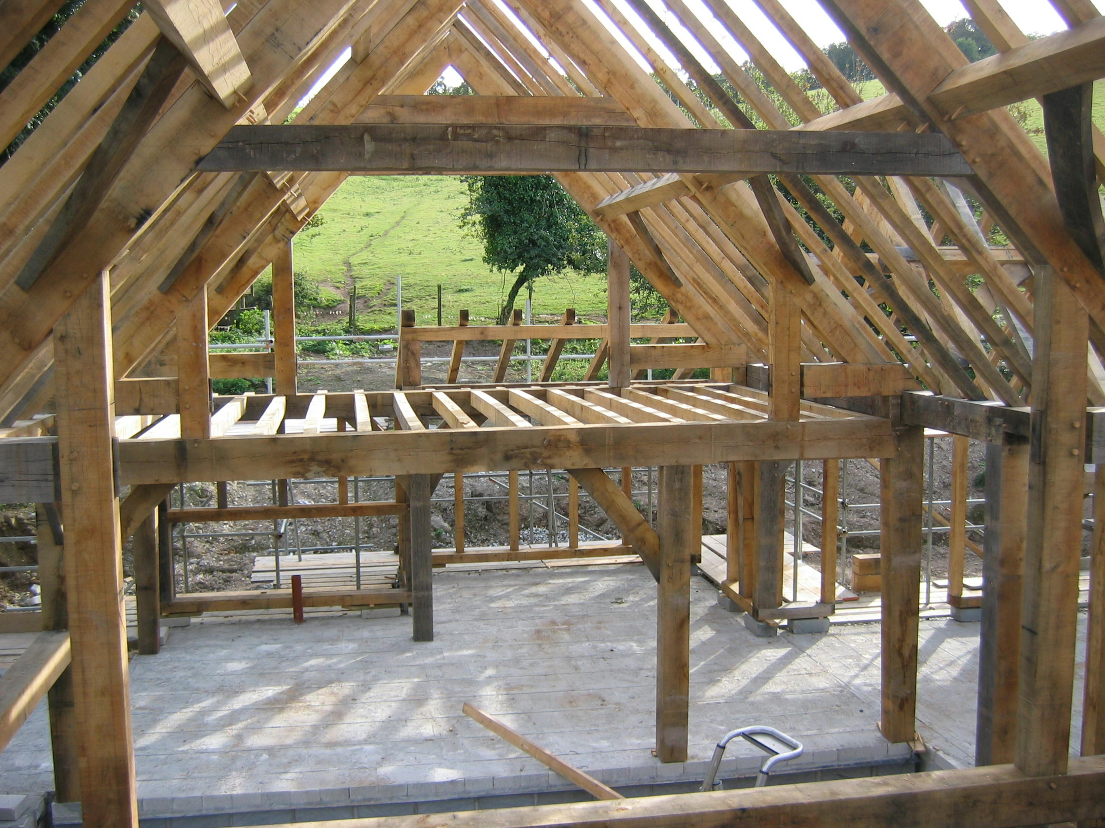 Pitched one-and-a-half-storey oak-framed home being installed on-site