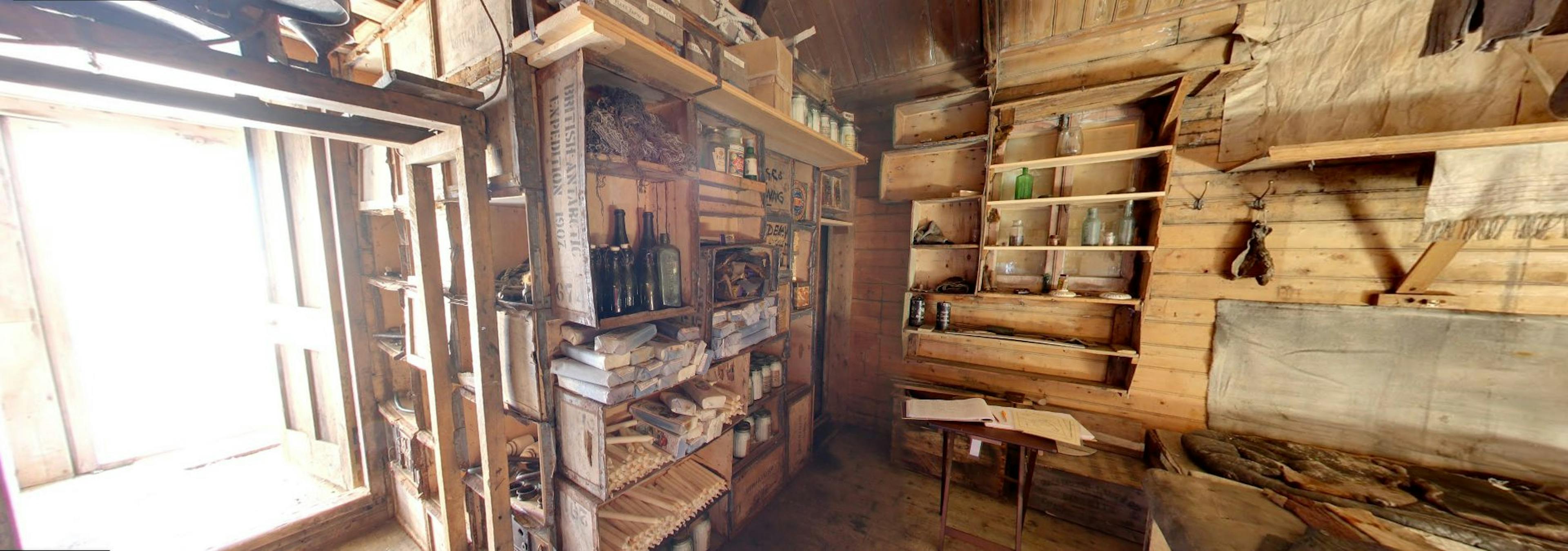 Inside a timber-framed conservation hut in Antarctica