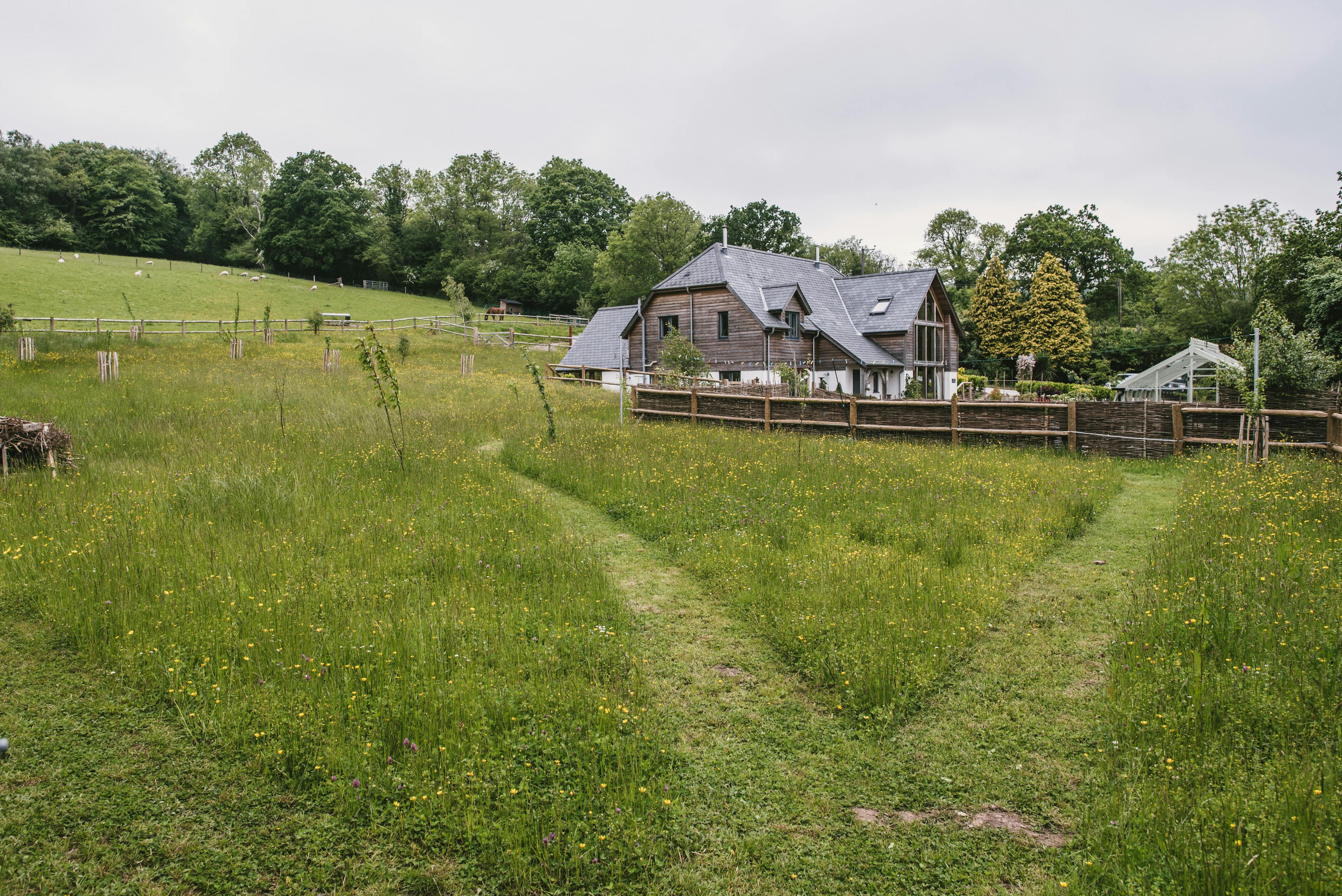 Two-storey oak-framed family home situated on a ten-acre smallholding, overlooking fields