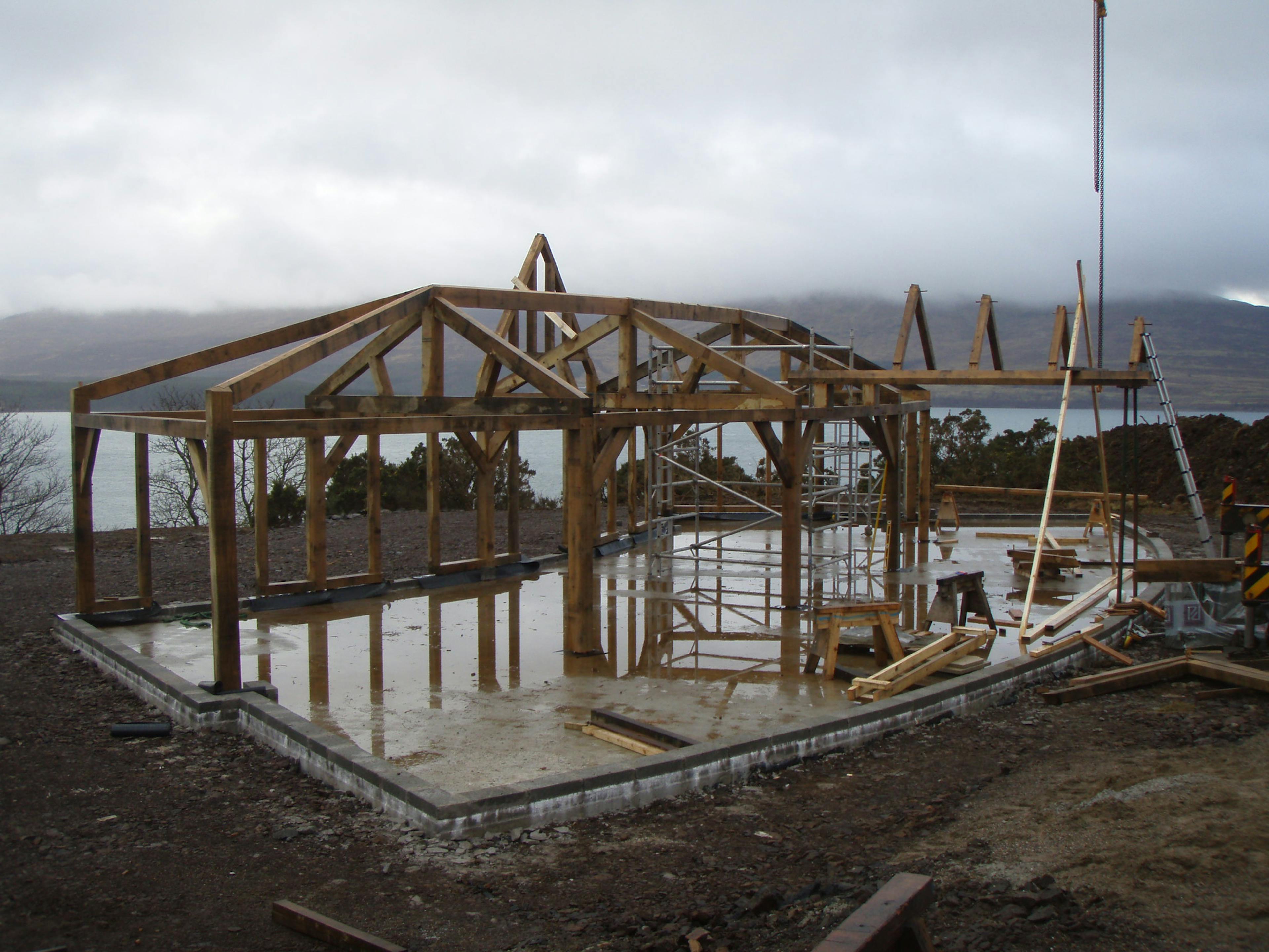 Site installation of a unique oak-framed family home on the shore of a loch