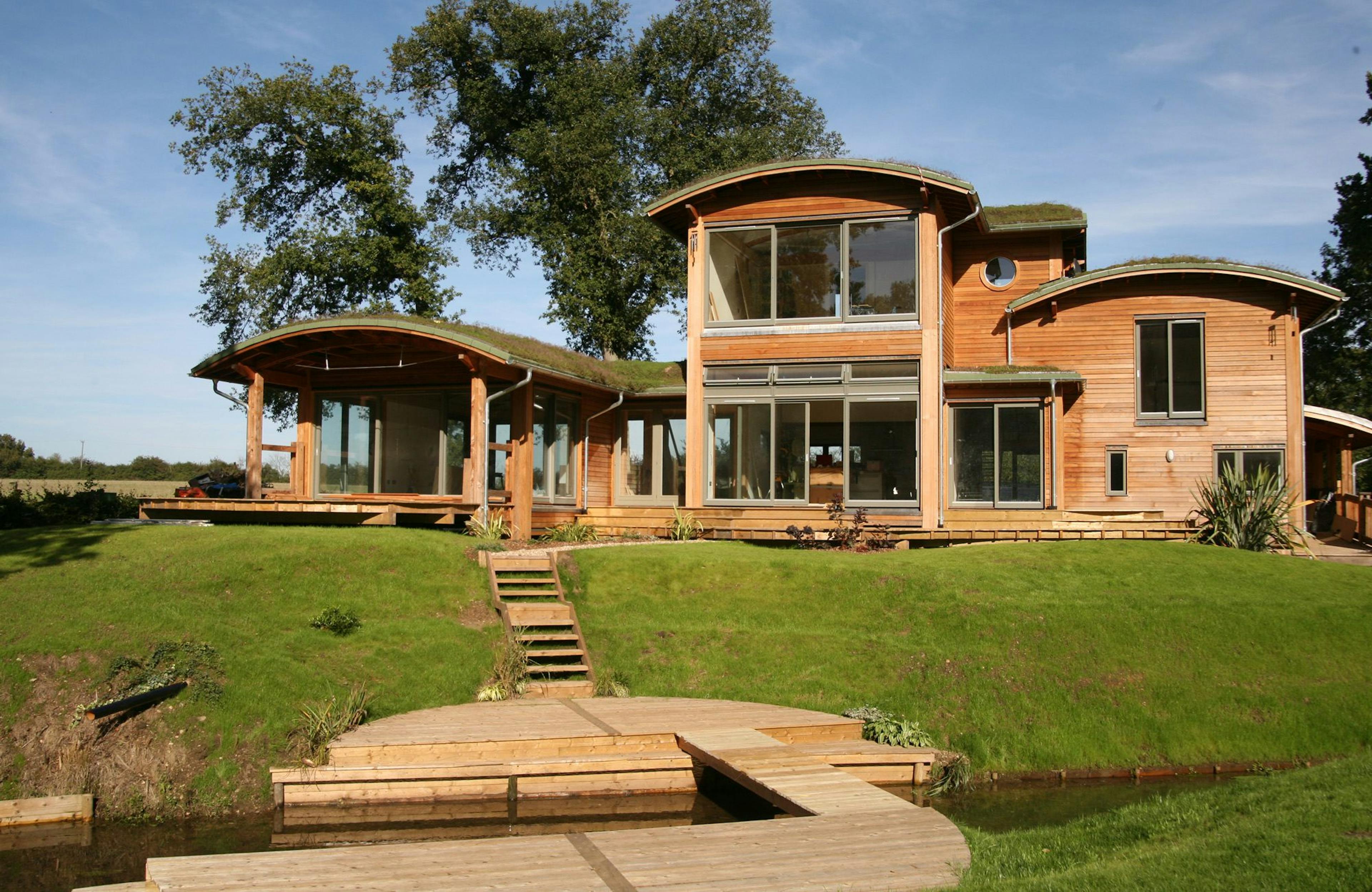 Wrap-Around Garden Surrounding a Douglas Fir-Framed Eco-Friendly Contemporary Home