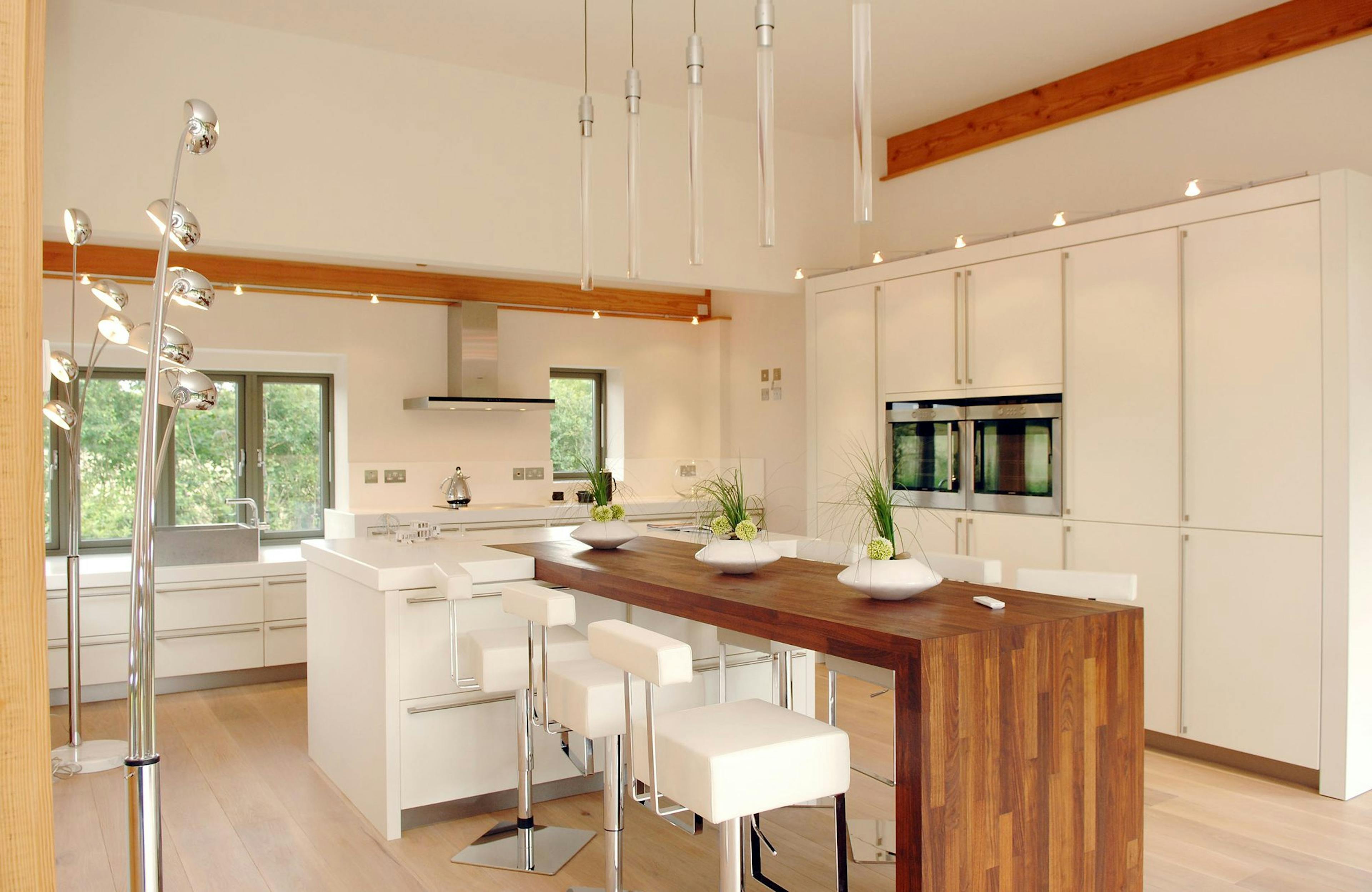 Open-Plan Kitchen with Douglas Fir Framing, Modern Finishes, and a Distinctive Timber Breakfast Bar