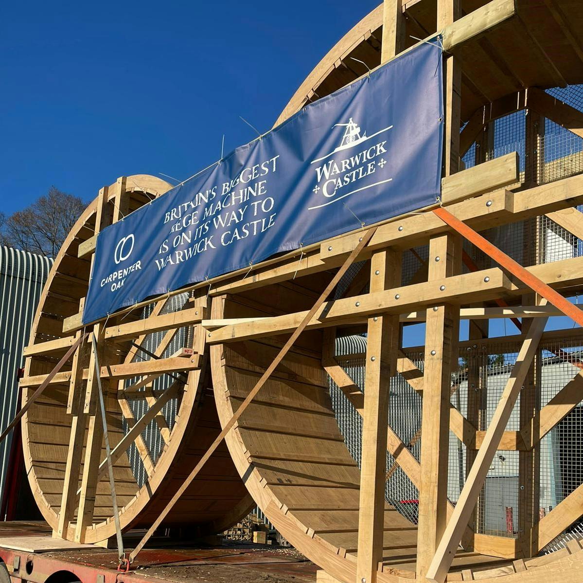 Two wooden wheels for a full scale trebuchet on a lorry