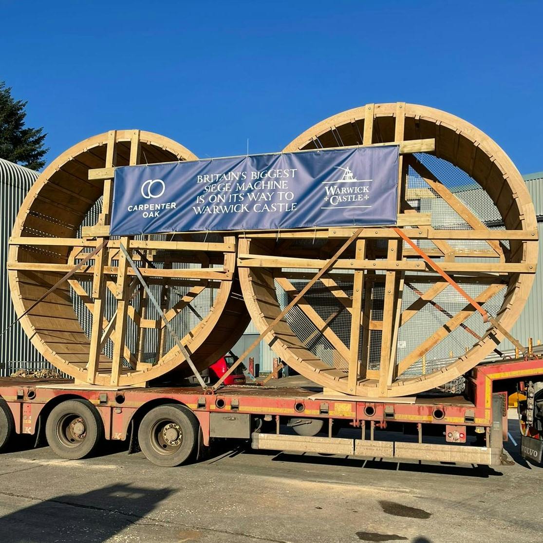Two wooden wheels for a full scale trebuchet on a lorry