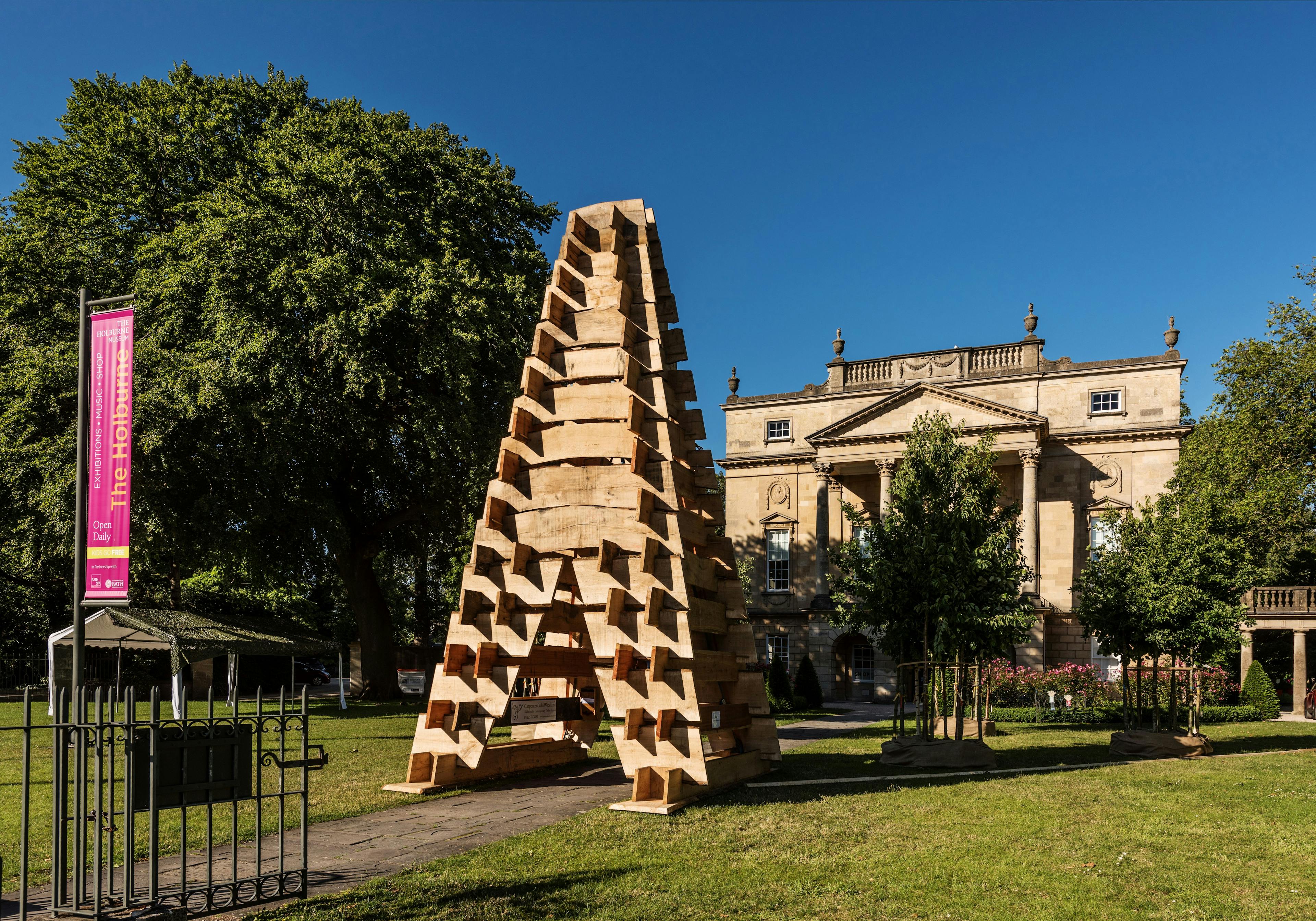 A wooden sculpture for the forest of imagination festival in Bath 2019 in front of the Holburne Museum